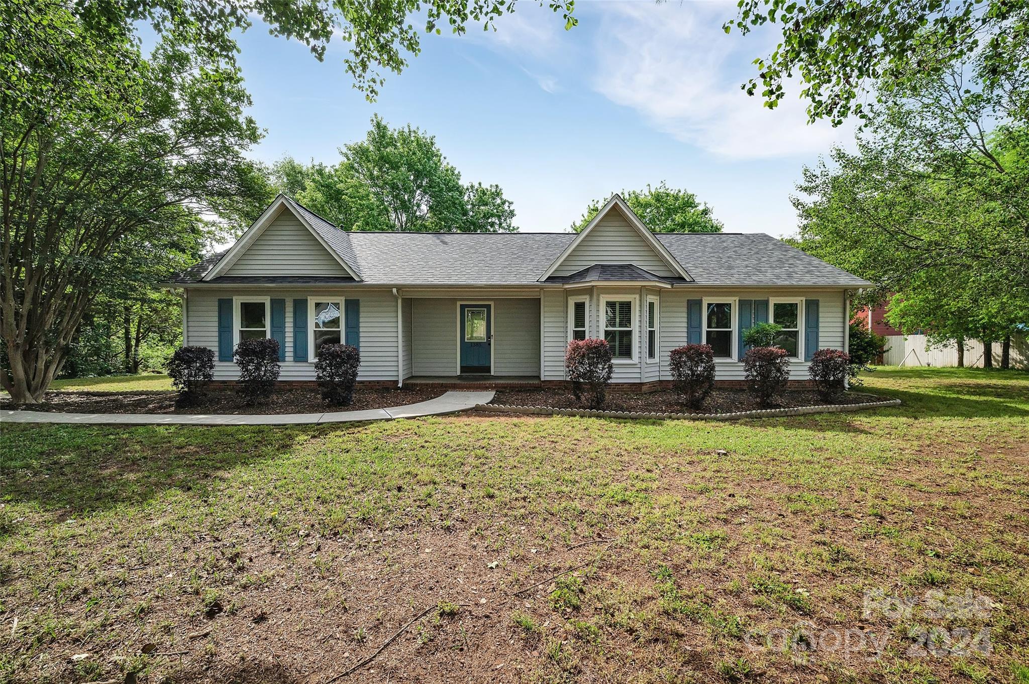 TIRED OF LOOKING AT WORN OUT HOUSES? STOP RIGHT NOW AND HURRY ON OVER TO 1385 RED OAKS DR IN ROCK HILL SC! NO KIDDING, THIS BEAUTIFUL HOME HAS THE PRIDE OF OWNERSHIP, SPARKLE AND SHINE YOU DESIRE. STRIKING SPLIT BDRM PLAN SO YOU CAN ENJOY PRIVACY IN THE PRIMARY STE. THIS IS READY TO MOVE IN AND ENJOY! AGENTS, BRING YOUR PICKIEST BUYER TO THIS WONDERFUL HOME! NEW ROOF APRIL 2024, NEW HVAC 2020!  Situated on just under an acre (.95 acres) of level land, you'll find the space you need outside AND inside. Inside, you'll find vaulted ceilings, lighted ceiling fans and lots of windows, making this so inviting and bright! The kitchen and dining room feature plantation shutters, breakfast bar, and laundry room right off the kitchen. The primary bedroom is dreamy, and also features a vaulted ceiling and lighted ceiling fan. Wait until you see the nice and bright primary bathroom with dual vanities, a whirlpool tub and walk-in closet too! COME AND SEE WHAT YOU'VE BEEN LOOKING FOR ALL ALONG!