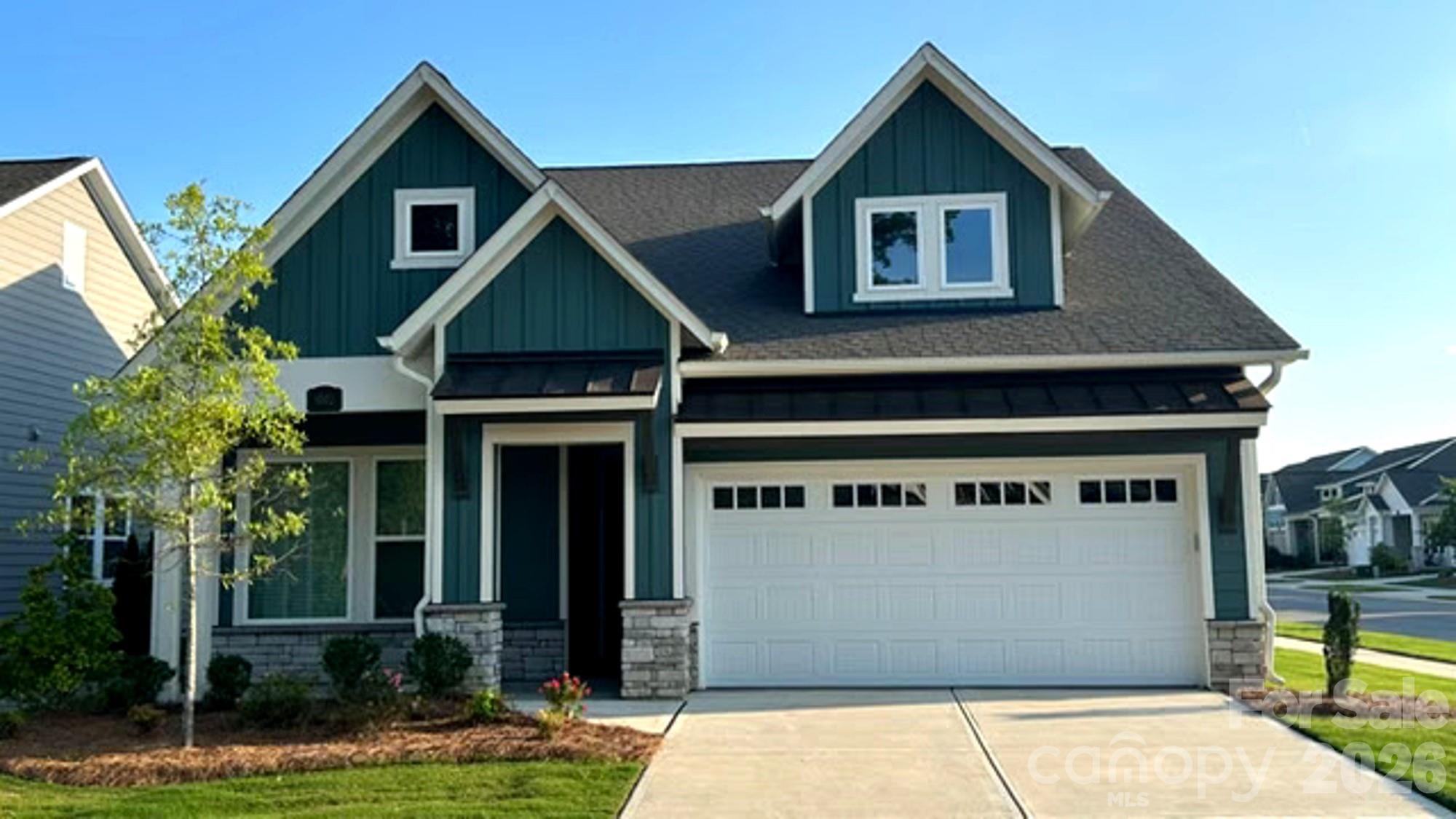 Just reduced and move-in ready! A rare opportunity in Encore at Streamside 55 and up community. —  Beautifully upgraded, ideally located, and thoughtfully designed for easy main-level living with additional space upstairs.
Perfectly positioned on a premium interior corner lot across from a wooded area, this home offers added privacy, a quieter setting away from main roads, and a larger backyard footprint. Inside, the open and light-filled floor plan is enhanced with designer finishes and comfortable, elegant living spaces. The gourmet kitchen is the centerpiece of the home, featuring a large quartz island, oil-rubbed bronze hardware, upgraded lighting, abundant cabinetry, and generous gathering space ideal for entertaining or everyday living. The inviting living area with fireplace flows seamlessly to the all-season covered porch—perfect for morning coffee, evening relaxation, or entertaining friends and family. The main-level primary suite provides a peaceful retreat with a spa-inspired shower and thoughtful details designed for comfort and convenience. A guest bedroom and dedicated office/flex room with French doors are also located on the first floor.  Upstairs, the spacious bonus room with full bath and closet offers exceptional flexibility as a guest suite, hobby room, media room, or additional office space, along with convenient walk-in attic storage.

Exterior maintenance and lawn care are included, allowing you more time to enjoy the incredible amenities Encore at Streamside is known for. Community features include a stunning 6,000 sq ft clubhouse, fitness center, pickleball courts, walk-in pool with sun shelf and in-water lounge seating, outdoor fireplace, dog park with covered seating, walking trails, and an active social calendar coordinated by an on-site Lifestyle Director.
Voted the #1 New Home Community in Charlotte, Encore at Streamside offers resort-style living just minutes from historic downtown Waxhaw, shopping, restaurants, local events, and the Southwest Regional Library. Lots of activities coordinated by an on site Activity Director.  There is even a dog park!
This home offers the rare combination of premium lot placement, thoughtful upgrades, low-maintenance living, and vibrant community lifestyle. Don’t miss your opportunity to make it yours — call today to schedule your private tour.