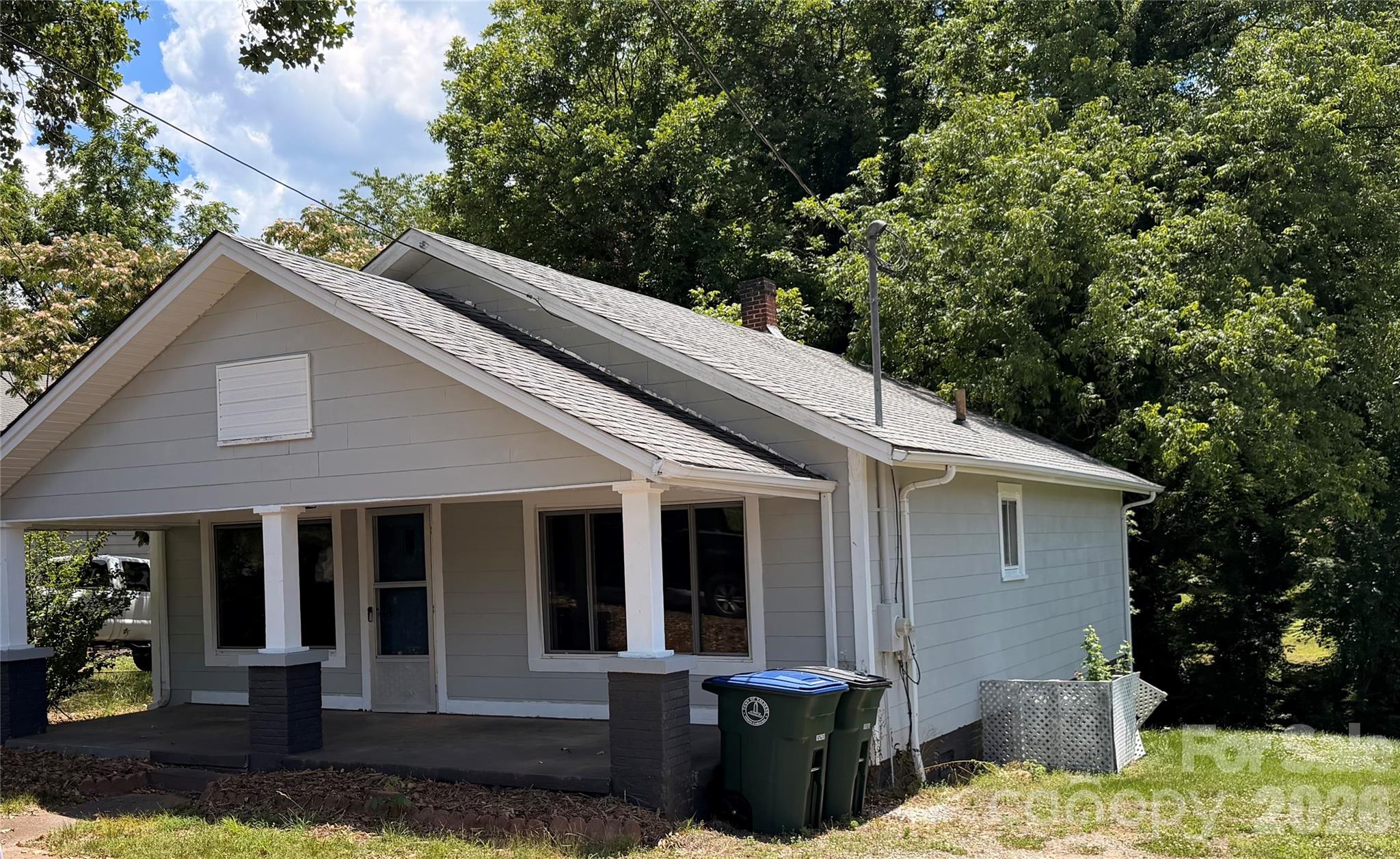 This partially remodeled home is conveniently located only a few blocks off of Main St in Valdese.  It is close to area churches, 3 minutes to a grocery store, restaurants, banks, and downtown.  15 minutes to a hospital, and 5 minutes to I-40.  Its an easy walk to town events.  Sit on the front patio or the back deck.  There is a small creek on the back of the property.
