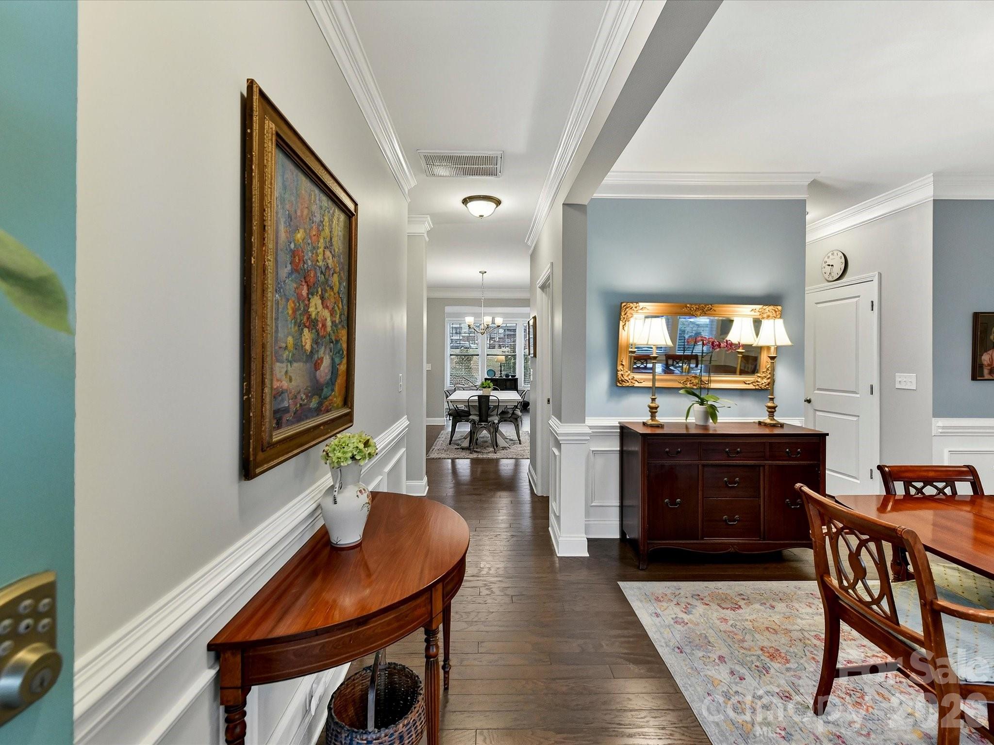 Just in time for Summer, enjoy RESORT STYLE AMENITIES including a clubhouse, outdoor pool, fitness center, playground, plus pickleball courts in this move in ready home with over 2500 sq ft! Featuring  A SUNROOM AND LOFT this home lives large in sought after Avondale! The charming curb appeal, inviting entry way, open and functional floor plan, and abundance of natural light will make you fall in love. Entertain in the formal dining room which leads to gorgeous designer kitchen w/gas cooktop, stainless appliances, large center island, and walk in pantry. Open to the kitchen is a bright breakfast nook, spacious living room with gas fireplace, and cheery sunroom that leads to outdoor patio perfect for entertaining. Upper-level boasts oversized primary suite, large walk in closet, soaking tub and dual sinks. Two other generously sized bedrooms, large hall bath with dual sinks, a loft space perfect for office or playroom, ample closet space, and laundry room complete the upstairs. Two car attached garage! Exterior was fully repainted in 2026, along with recently painted interior making this home move in ready. Neighborhood is highly desirable with resort-style amenities including clubhouse, fitness center, pool, and playground and within Indian Land School District. Short drive to Ballantyne for premier shopping, dining, and entertainment.