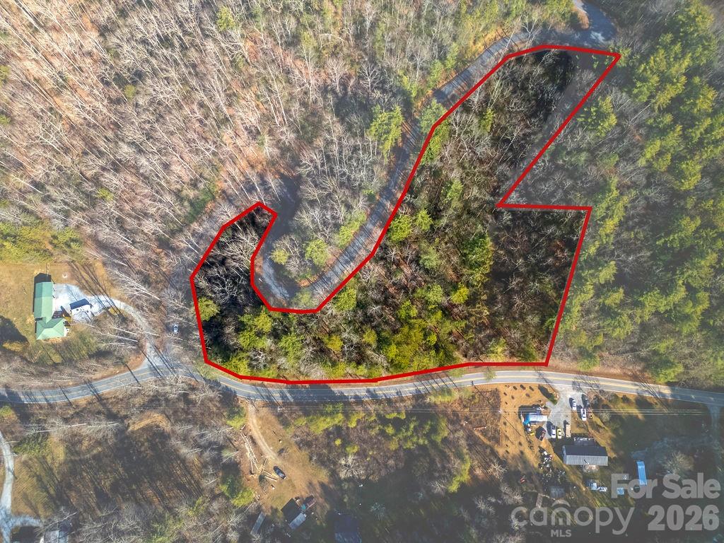 Three parcels totaling 3.75 acres situated in the Scenic Frozen Creek Valley. These lots are less than a mile from the entrance to Gorges State Park. There are multiple build sites and you can hear the tranquil sounds of Frozen Creek from the property. A small stream runs through one of the lots. Discover the quiet and private mountain community of Oak Laurel. The neighborhood's minimum build size is 1200 sq ft. and the annual dues for all three lots is $600 per year.