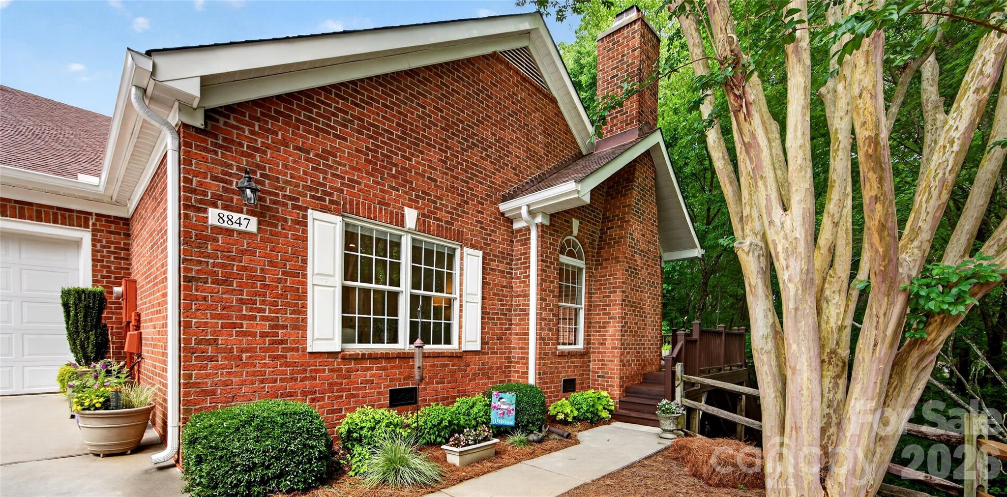 Beautiful home with designer finishes and high-end appliances. One of only six ranch style homes with finished basement in Windsor Oaks. This home features two bedrooms, office and laundry on the main floor. Refinished white oak hardwoods on the main. Vaulted ceiling great room with fireplace. Open floor plan with seamless flow between the dining, kitchen and great room. Large primary suite features a walk-in closet and spa-like bath with large steam shower. Also on the main level are a secondary bedroom and full bath with jetted soaker tub. Office/den on the main with spacious built-ins. Basement features large family room with fireplace, bedroom, full bath, flex room, finished and unfinished storage. Lower level is perfect for visiting guests, additional office, hobby or exercise space. Gorgeous, lush, private setting overlooking a preserved wooded area with stream.  Main level deck off the great room is perfect for a morning cup of coffee and screened porch off the family room is large enough for dining and gathering. Windsor Oaks community’s clubhouse and pool are in close proximity to this home. Very convenient to Ballantyne shopping and dining favorites. Main entrance off Rea Road and back entrance off Elm Lane.