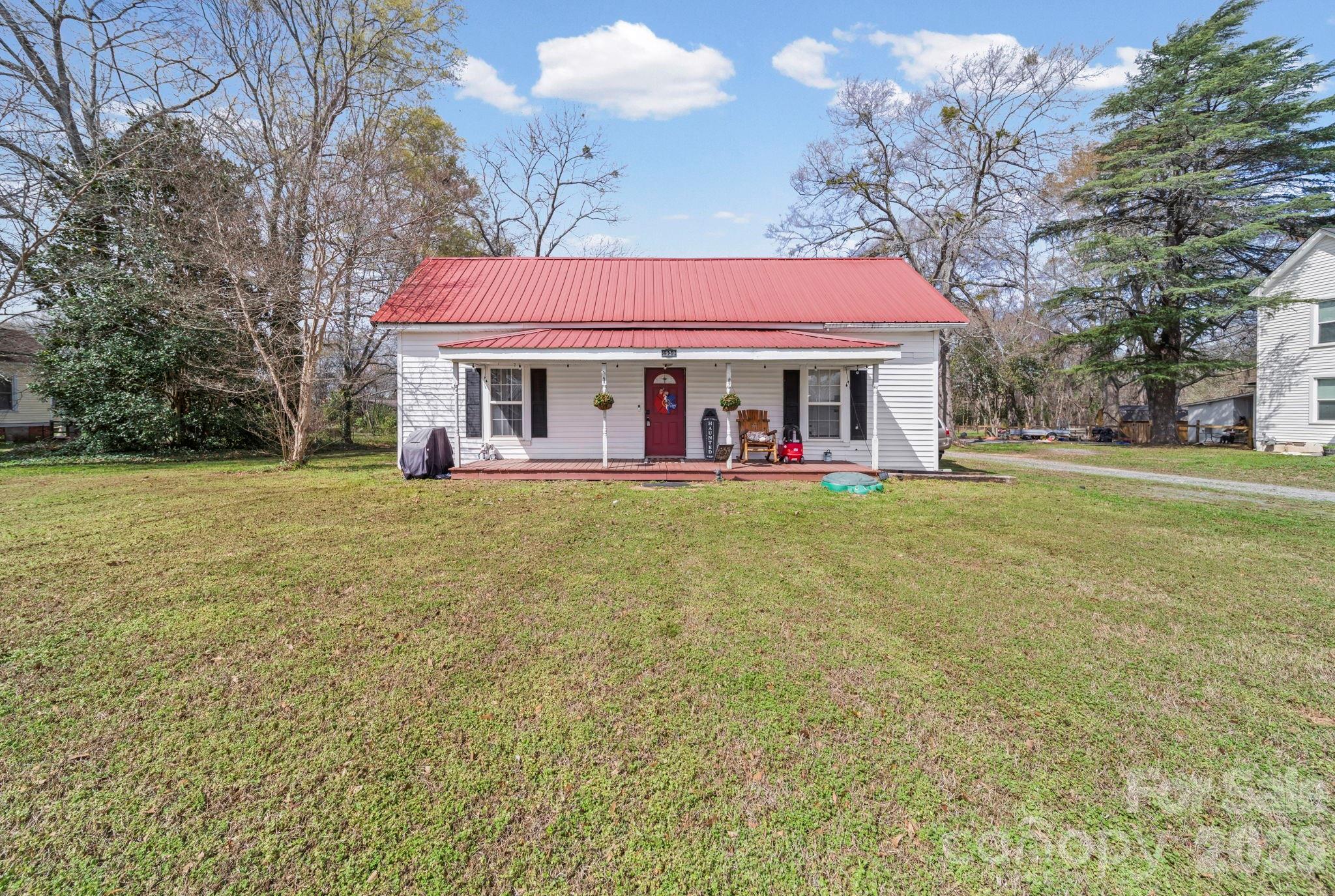 ***Price Improvement****Well maintained 3 bed 1 bath single story home with high ceilings. Almost 1/2 acre of flat land for your enjoyment. Kitchen has granite countertops, high ceilings, large bath, ceiling fans and much more. Large front porch for enjoying the view and back porch that is enclosed 22X6 for extra space to utilize. There is potential to add a second bathroom. Close to shopping, entertainment, restaurants and more. Come see it today. **Price Improvement***