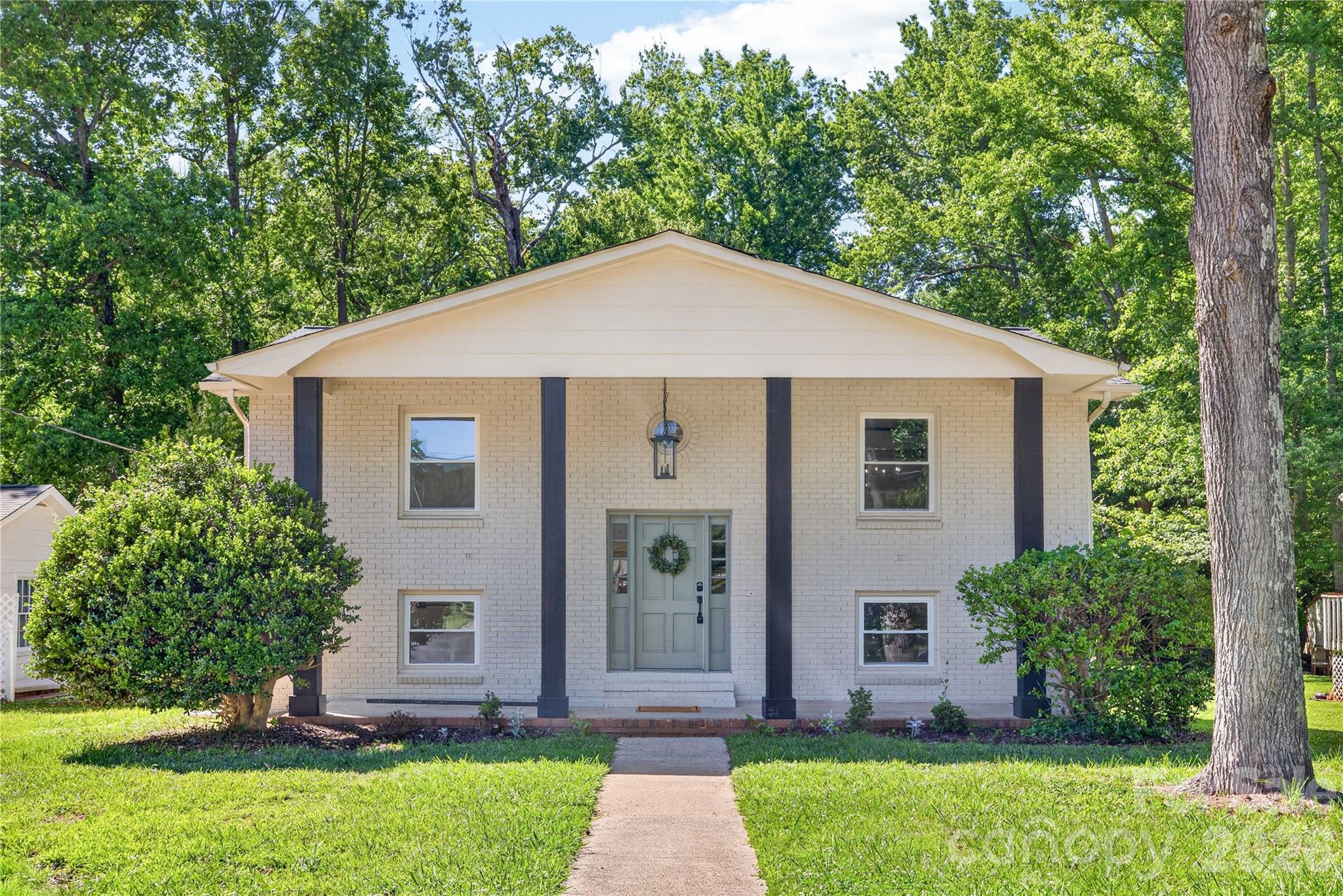 Welcome to 5701 Ilford Street—where modern design meets timeless charm in one of East Charlotte’s fastest-evolving pockets.
This fully renovated 4-bedroom, 2-bathroom home offers approximately 1,900 square feet of thoughtfully reimagined living space on nearly half an acre. Originally built in 1970, this split-level residence has been transformed with unique, modern touches that elevate every corner—creating a home that feels both fresh and distinctive.
Step inside to discover a bright, inviting interior with an effortless flow between living spaces. The layout offers flexibility for today’s lifestyle, with multiple living areas ideal for entertaining, relaxing, or creating a home office or flex space. 
The updated kitchen and living spaces blend style and function, while all four bedrooms provide comfortable retreats. Outside, the expansive 0.49-acre lot offers endless possibilities—whether you envision outdoor entertaining, gardening, or simply enjoying the privacy of your own backyard oasis. 
Beyond the home itself, the location is what truly sets this property apart. Situated in the Shannon Park area of East Charlotte, you’re positioned in the path of significant growth and revitalization. The nearby Eastland Yards redevelopment—a transformative, multi-phase project—includes a planned sports complex, park space, retail, and residential development, bringing new energy and long-term value to the area.
5701 Ilford Street isn’t just a beautifully renovated home—it’s an opportunity to be part of a neighborhood on the rise.