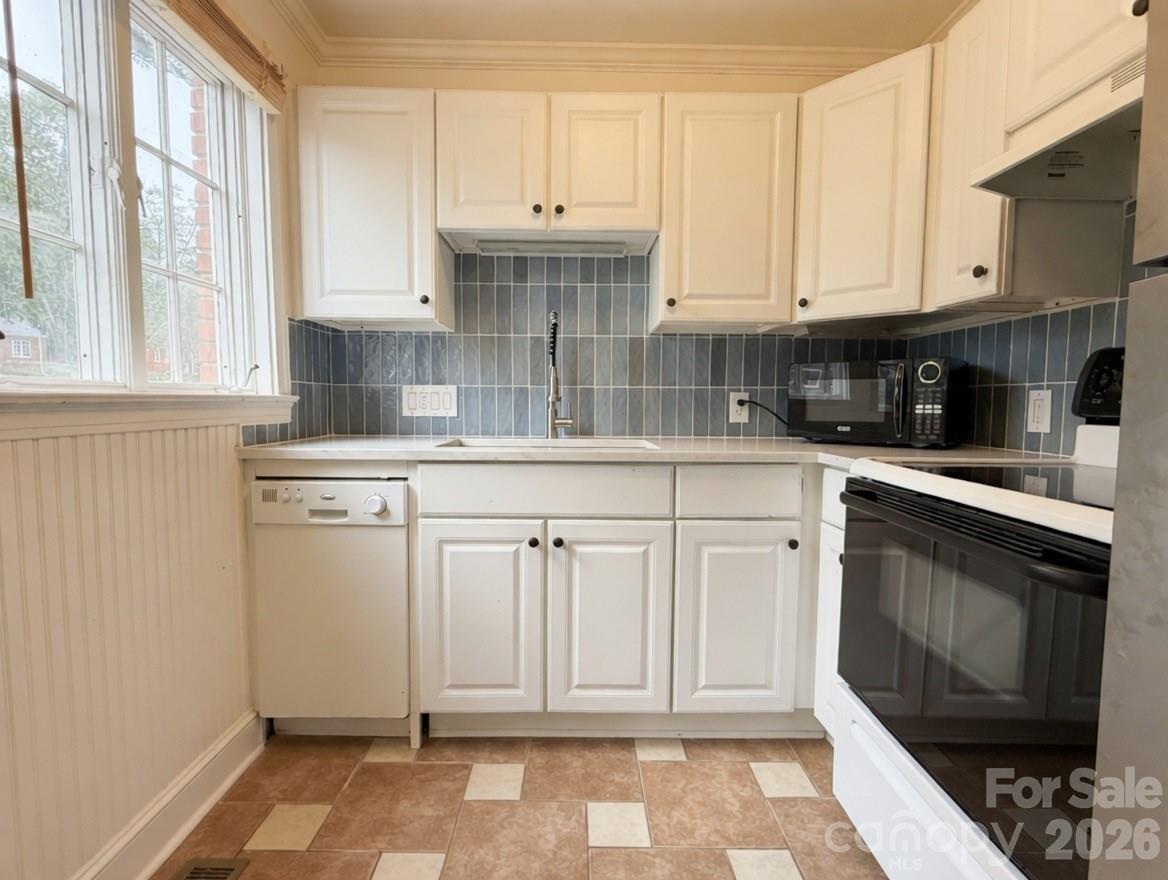 Walk to Freedom Park, Selwyn Ave, Montford, and Park Road Shopping Center — Myers Park living at a price that makes sense.

This move-in ready ranch condo checks the boxes buyers spend years searching for: original hardwood floors, full brick construction, and a beautifully updated kitchen featuring quartz countertops, a blue-tone tile backsplash, and a new stainless steel sink. Two bedrooms, one full bath, and a layout that just works.

Priced $40,000 below the last sale in the community, this is one of the most compelling values in Myers Park right now. The HOA covers water, exterior maintenance, and landscaping — low-maintenance ownership in one of Charlotte's most walkable, sought-after neighborhoods.

Investors take note: no rental cap, strong demand, and units here lease quickly. Schedule your showing before this one is gone.