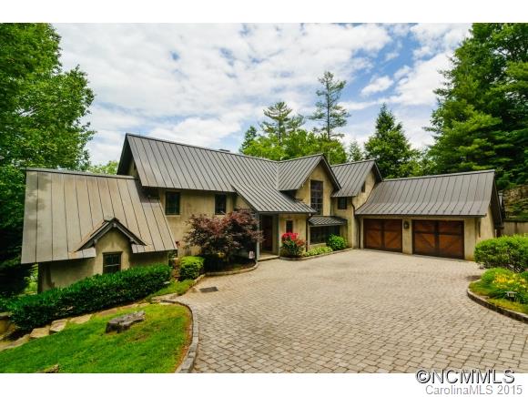 Exceptionally well built house w/ all the upgrades. Gated home w/ dumb waiter, wine room, Crestron Control system, whole house sound system, alarm system w/ camera surveillance, irrigation system, hot tub, whole house generator, Solarie infrared grilling system on screened porch & double-faced rock wall around perimeter of property. Waterfront has extensive rock patio, docks, fire pit w/ gas starter, boathouse w/ sundeck & outdoor kitchen w/ grill & fridge. Copper roof & gutters. Must see!