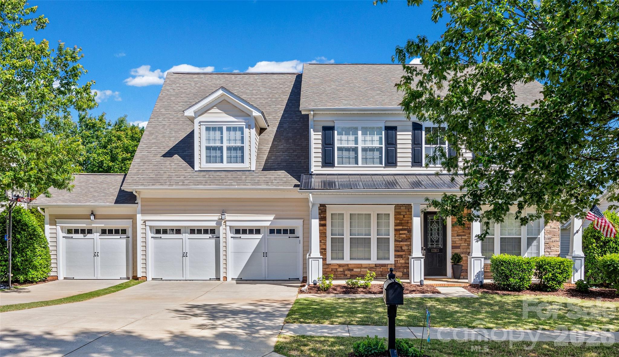 Nestled in a private backdrop, you won't want to miss this 3-car garage home in the prestigious Reserve at Gold Hill! From the moment your enter the rocking chair front porch, details abound with heavy molding and soaring ceilings welcoming you in! You are flanked by a flex/office space and the formal dining, that takes you into the great room - which is entered by a cozy gas fireplace and looking out onto the stunning 3 season room. The kitchen is spacious and boasts gas cooking, wall ovens, walk-in pantry, endless counter space, stainless steel appliances, and more! Also on the main level is a bedroom and full bathroom. As you head upstairs, you'll be impressed with the amount of space and layout. The primary suite boasts trey ceiling, spa-like bath with soaking tub, walk-in shower, and dual vanities, and a custom walk-in closet. There are another 3 bedrooms and secondary bath upstairs, providing tons of space. The laundry room has cabinets for extra storage and a large counter area. And to round off the upstairs, a spacious bonus/loft space provides flexibility. As you head to the backyard, the 3-season room is the ideal place to enjoy the expansive and level yard, fully fenced, enjoying your morning coffee or entertaining guests. This home abounds in features, including all solid-surface flooring (no carpet), the roof was replaced in 2022, new HVAC and furnace in 2019, new hot water heater in 2021, garage door units 2024, 3 season room added in 2024, and more! Reserve at Gold Hill offers resort style community amenities including an expansive outdoor pool, clubhouse, playground, airnasium pickleball court, sidewalks, walking trails, and 2 entry points to the community - with low SC taxes and award-winning schools, look no further for your next home!