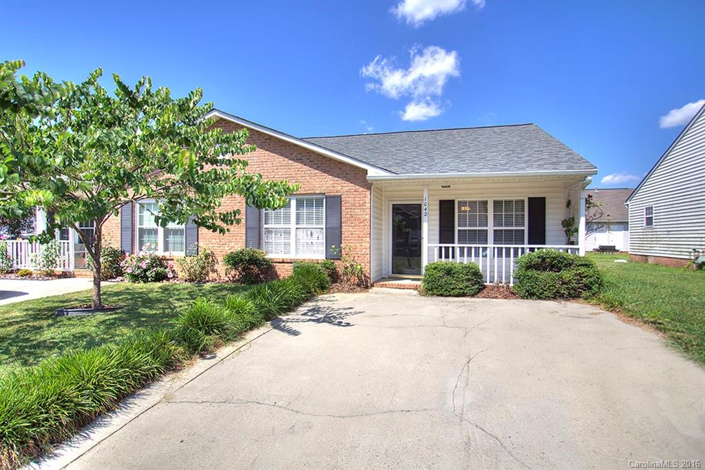 Ready to move into one level home with private driveway in convenient Rock Hill location.  2 BR with 2 full baths.  Open family room dining room combination.  Cute kitchen with window for natural light.  Ceiling fans in master bedroom and living room.  Neutral paint and carpet.  Fenced back yard.