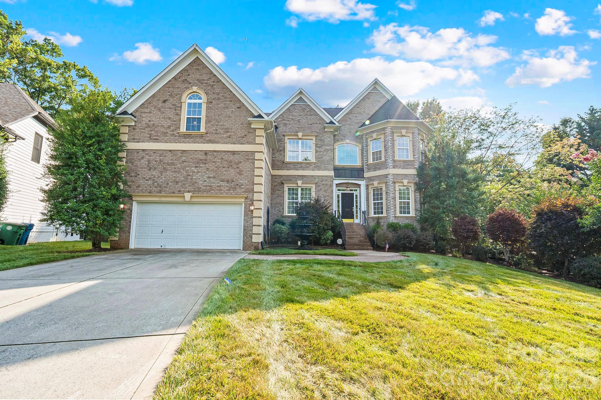 Thoughtfully designed and extensively customized, this exceptional residence has evolved far beyond its original floor plan with timeless design, expansive living spaces, and quality craftsmanship throughout. A curved staircase, tray ceilings, a butler's kitchen, multiple gathering areas, and a main-level accessible suite create a space that is equally suited for everyday living and effortless entertaining.

Outdoor living is just as inviting with covered spaces, a remote-controlled retractable awning, and a detached storage shed complete with water and electricity. Every addition and enhancement was thoughtfully planned, resulting in a rare combination of comfort, functionality, and enduring quality.

Ideally located in Cornelius just minutes from Lake Norman, with convenient access to Charlotte, shopping, dining, and recreation.