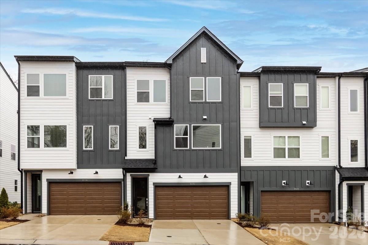 At 8030 Cedarsmith Ct in Archer Row, everyday living feels bright, flexible, and thoughtfully designed. A two-bay garage and welcoming entry lead to a first-floor flex space with a full bath and tiled walk-in shower, ideal for guests, a home office, or a private retreat. Just outside, a covered outdoor living area extends your space and invites quiet moments at home. Upstairs, oak box stairs with open rails open to a light-filled main level where the gourmet kitchen shines with white cabinetry, white quartz countertops, an electric cooktop, and large windows. A second outdoor living space offers peaceful tree-lined views, creating seamless indoor-outdoor flow. The primary suite features tray ceilings, abundant natural light, a spacious walk-in closet, and a bath with dual vanities and a tiled walk-in shower. With a community dog park and a boutique neighborhood feel, Archer Row offers a lifestyle that is both low-maintenance and connected.