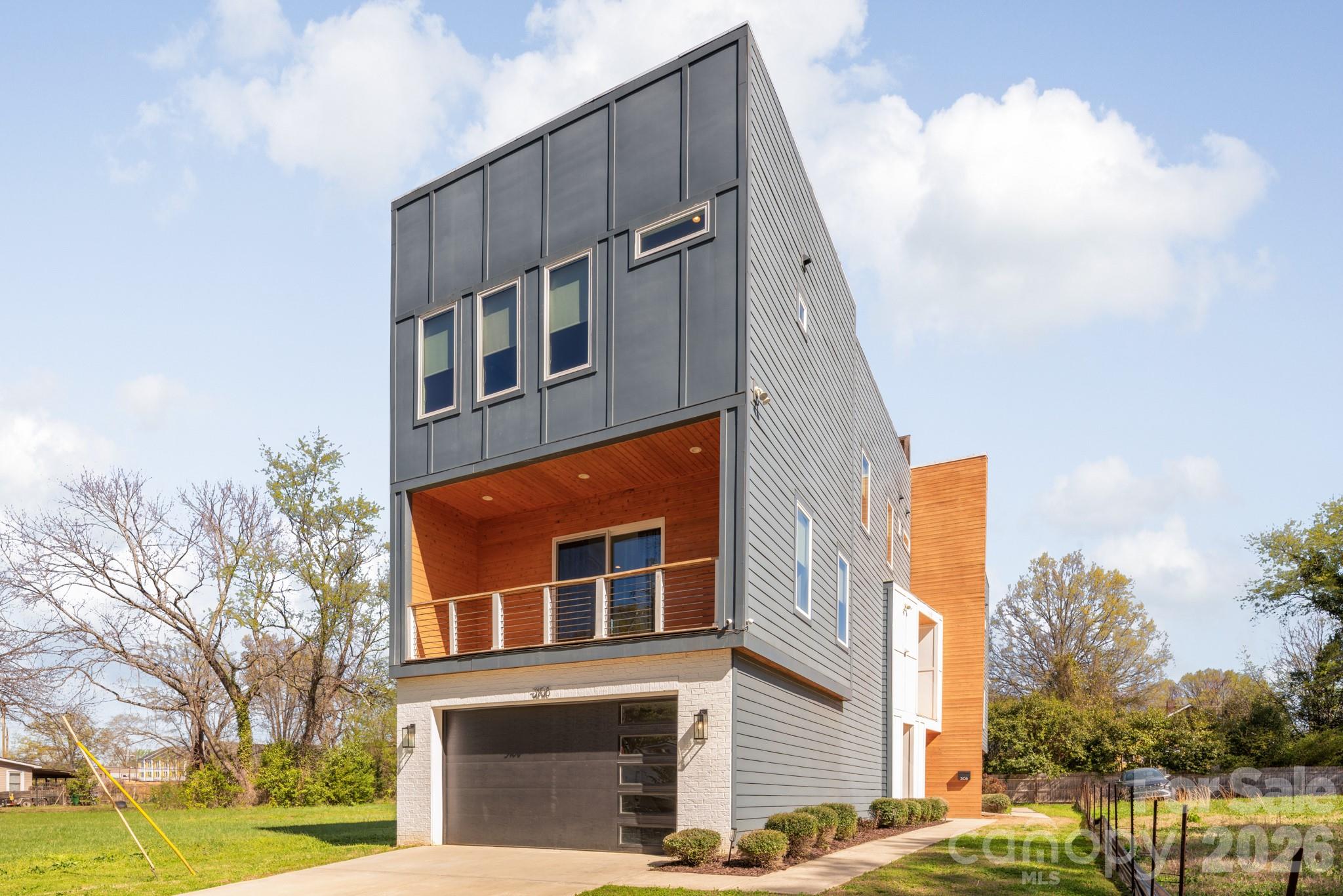 Gorgeous duet in Enderly Park built in 2020.  The spacious, open layout spans 2,842 square feet, features 3 bedrooms, 3 full bathrooms and 2 half bathrooms, a balcony, rooftop terrace, and a two-car garage.  Enter on the main level, which has a bedroom, a full bathroom, a laundry room, and a drop zone off the two care garage.  Continue up the beautiful staircase to the second level, where you'll find a spacious family room, a dining area, and a stunning kitchen.  The kitchen has beautiful stainless steel appliances, quartz countertops, a walk-in pantry, gas range, and a kitchen island. On the third level, you have two primary bathrooms, both with an amazing bathroom, quartz countertops, a walk-in shower, and a walk-in closet.  Also, on the third level is a second bedroom with a full bathroom and walk in shower.  Make your way to the fourth level and the large rooftop terrace with views and the deck was just replaced (1,025 square feet).   There are two laundry areas, a laundry room and a laundry closet.  The refrigerator and washer and dryer convey with the property.