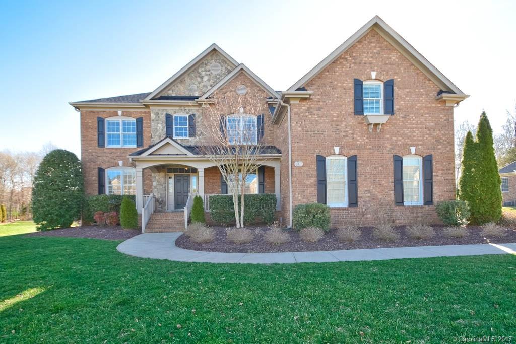Picture perfect home with all the bells and whistles on a prime level and wooded lot! Full brick w stone accents, full front porch, formals plus GR, guest suite (BR 5) on main level, gourmet kitchen with upgraded cabinets, SS appliances including double ovens and large island, huge master with amazing closet space including organizer systems, huge bonus room plus finished 3rd floor, backyard living includes large patio and fireplace, clean and well maintained!