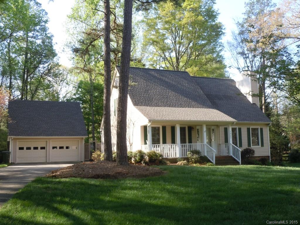 Southern charm with a wonderful yard for gardening. Rocking chair front porch. 1st floor master, upstairs bedrooms with room to sleep, play and live. Kitchen/breakfast area overlooks fabulous views of the fenced backyard and large deck. Oversized garage features a 2nd floor unfinished area. Lots of storage and separate building for play house/greenhouse or storage.  Home has a new roof and HVAC.
