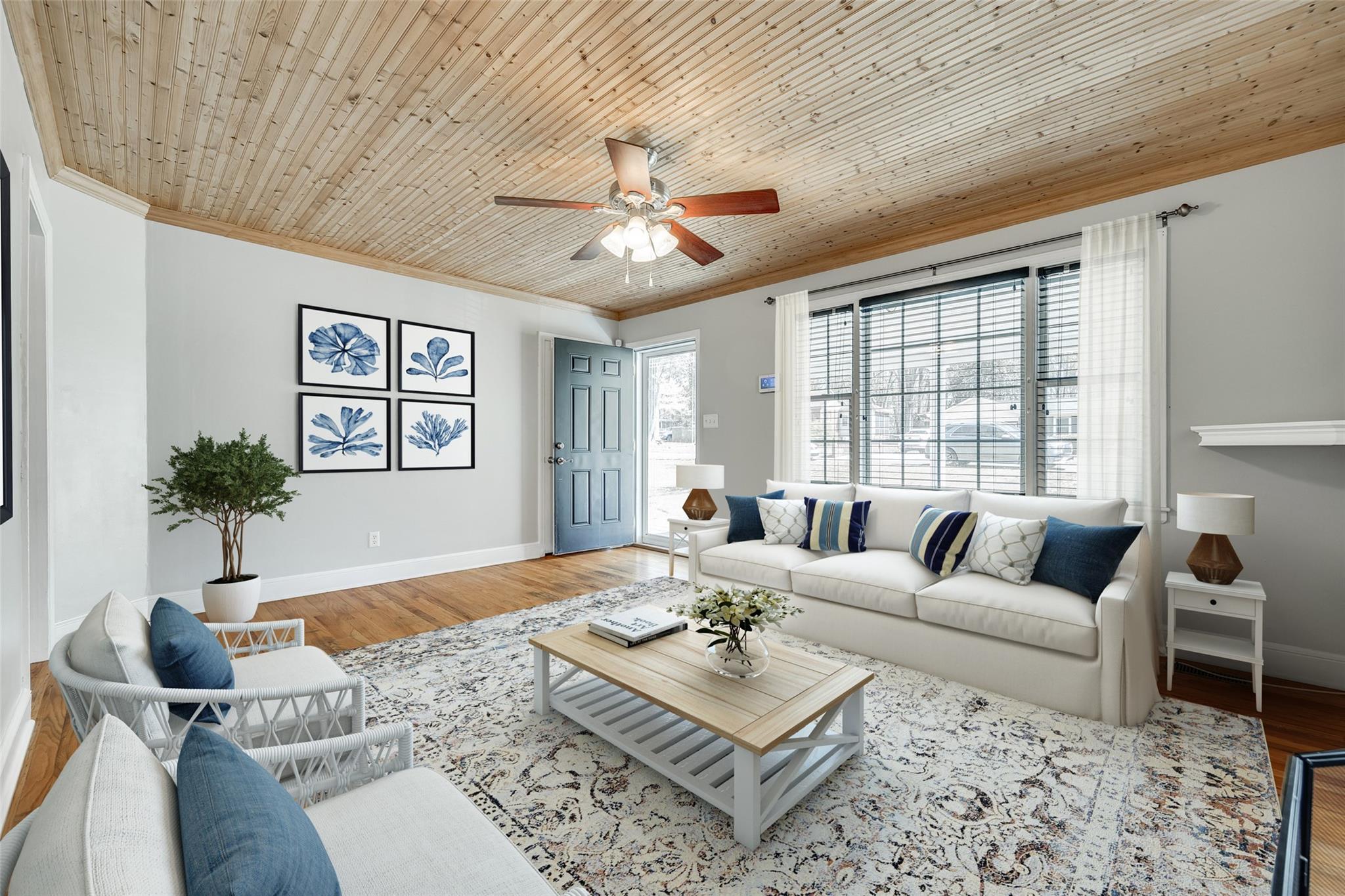 This cottage is absolutely darling. Sip your sweet tea on your large wrap around porch. Enjoy beautiful original hardwoods in most of the home and beadboard ceilings in the living room and kitchen. So much charm! Walk to town to visit shops and restuarants and turn the garage into your perfect she shed or workshop. There is even a carport in the back to use for storage. New paint inside and on the front porch plus a brand new hot water heater. This home has so much potential and you'll love calling Wiley Avenue home.