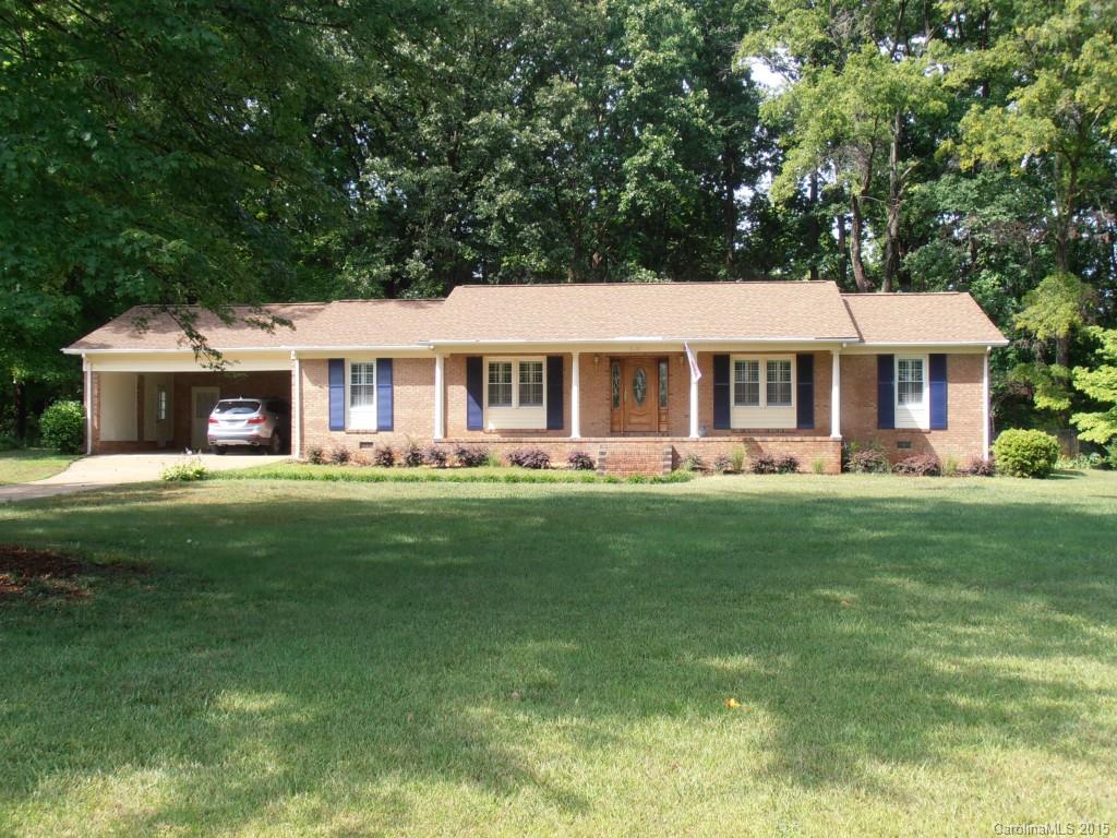 If you have been looking for a 4 bedroom brick ranch in great condition, you must see this one! The home features hardwood floors, granite counter tops with ceramic back splash, new appliances, marble top double sink vanity in guest bath and a glass sun room with oversize deck that overlooks wooded fenced backyard.  Owner has added many upgrades... from new windows, plantation shutters, kitchen cabinets, water heater, hardwoods, sun room, shower doors in master, bead board on ceiling in carport.