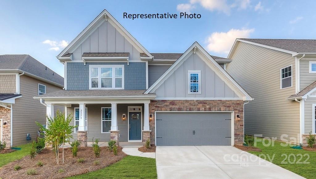 The Hampshire features an open floorplan with a spacious kitchen open to the family room plus first floor guest suite and drop zone at the garage entrance. Gourmet kitchen showcases kitchen island, gas cooktop, vented hood, with built in wall oven and microwave.   Just off the kitchen is a large walk in pantry and butler's pantry. The primary suite features a tray ceiling, sitting room and large walk-in closet. Community offers resort style amenities in sought after location, close to Ballantyne conveniences with low Lancaster County taxes! REPRESENTATIVE PHOTOS