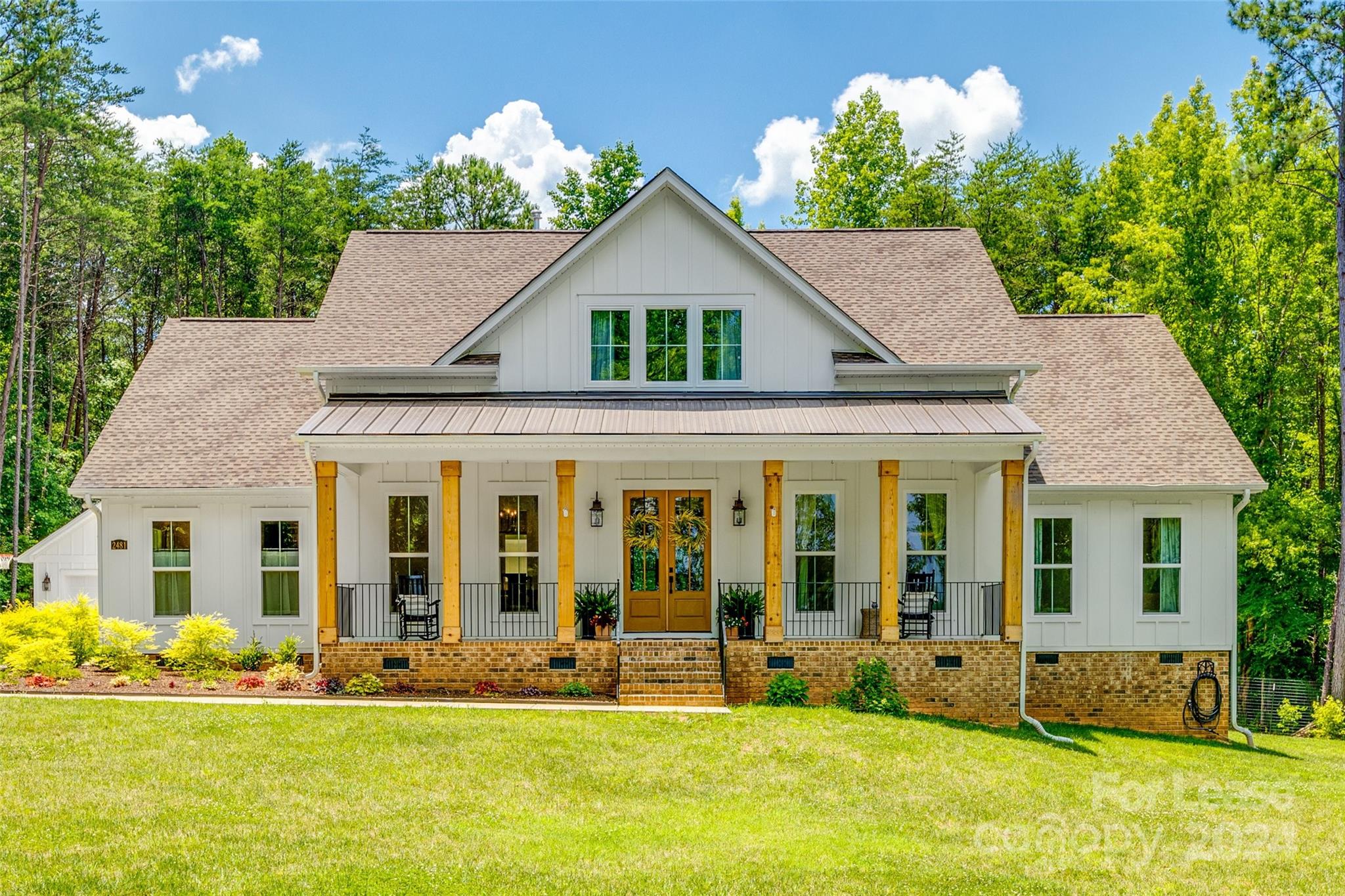 Gorgeous 4 bedroom 3.5 bath on 6+ acres in York. This luxury home has much to offer starting with the LVP flooring throughout and tiled baths. The living room boasts large brick columns, exposed ceiling beams, a gas fireplace, and an open floor plan. The kitchen features custom cabinets, quartz counters, built-ins, a walk-in pantry, an island w/breakfast bar, a gas cooktop, and double wall ovens. The formal dining room has built-ins. The primary bedroom is spacious with an en-suite bath, a large walk-in shower, and a custom double sink vanity. 2 bedrooms are nicely sized with a shared hall full bath w/shower/tub combo. The fourth bedroom is large with an ensuite bath and a step-in shower. A mud room with a drop zone and the laundry room are located at the back door. The backyard is private and perfect for entertaining or simply relaxing with its covered porch and oversized patio. Pets conditional. **No cats** There is a chicken coop and fenced area in the yard that will stay.