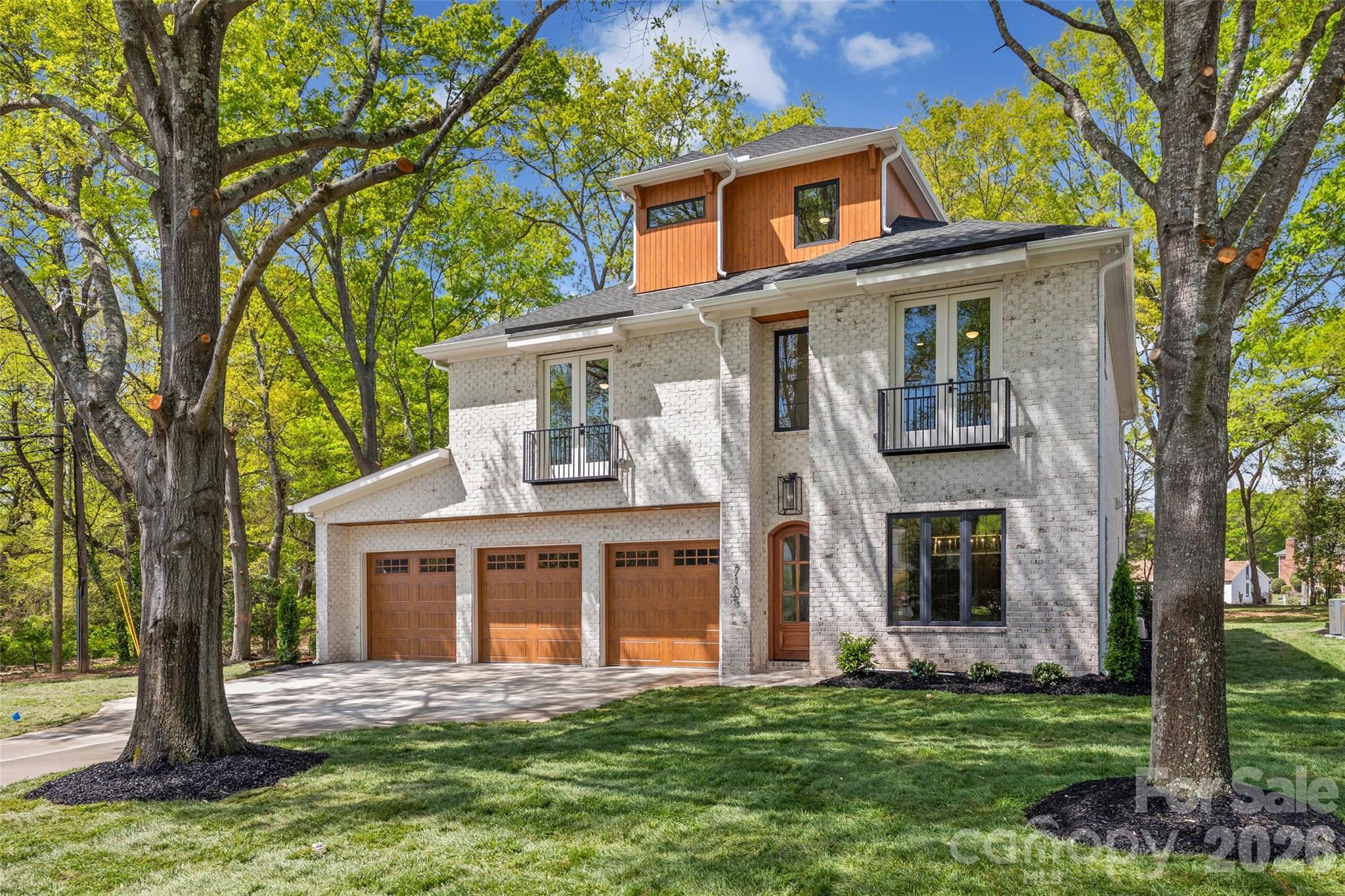 Experience refined living in this stunning full-brick luxury home located on a quiet street in highly desirable South Charlotte. Offering five spacious bedrooms and four-and-a-half beautifully appointed baths, this home blends timeless elegance with modern functionality.

The thoughtfully designed floor plan features an elegant butler’s pantry, a private home office perfect for remote work, and a versatile third-level flex space ideal for a media room, playroom, or additional guest retreat. High-end finishes are showcased throughout, creating a sophisticated yet comfortable atmosphere in every room.

The expansive primary suite serves as a true retreat, featuring a large bedroom filled with natural light, a luxurious ensuite bath with spa-like appeal, and an impressive walk-in closet that conveniently connects directly to the laundry room for everyday ease and efficiency.

Designed for both everyday living and entertaining, the home extends seamlessly outdoors to a covered patio complete with a beautiful fireplace—perfect for relaxing evenings or hosting guests year-round.

With exceptional craftsmanship, generous living spaces, and luxurious details at every turn, this South Charlotte residence offers the perfect balance of style, comfort, and convenience.