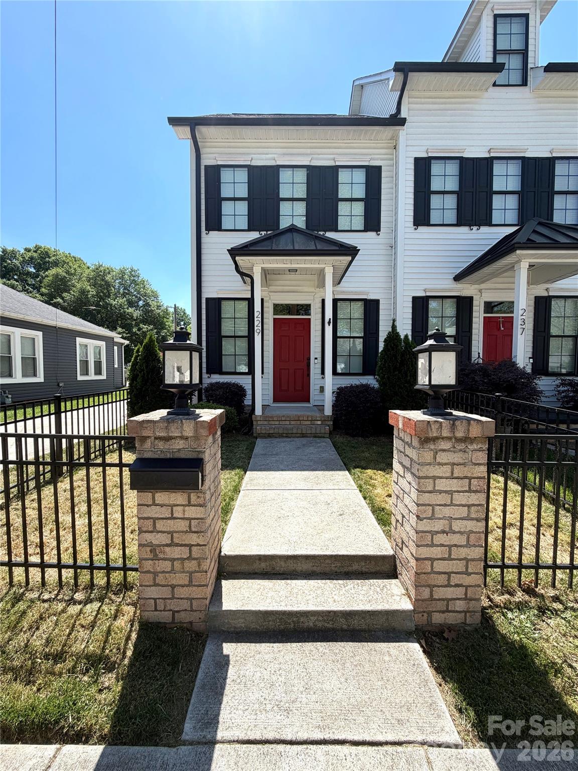 Experience the perfect blend of modern luxury and small-town charm in the heart of Kannapolis—one of North Carolina’s most exciting, up-and-coming cities. Ideally located to offer easy access to everything this revitalized community has to offer, this light-filled end-unit is a masterclass in thoughtful design. Every detail has been curated with intention, featuring high-end upgrades like elegant quartz countertops, stainless steel appliances, and a classic Kohler farmhouse sink. From the warmth of the wood stairs to the refined, high-end bath fixtures, it is clear that no detail was overlooked. With its open-concept floor plan, soaring ceilings, and inviting, southern-inspired exterior, rear entry garage, this home isn’t just a place to live—it’s an opportunity to join a thriving, forward-thinking community.