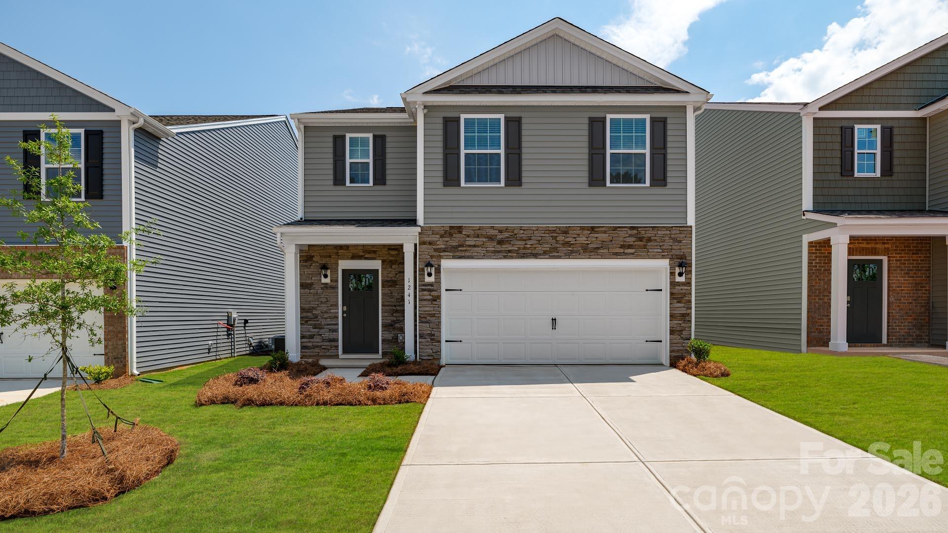 Valley View, a new construction single-family home community awaits you. Nestled in the beautiful Blue Ridge Mountains, and just minutes from both Maggie Valley and Waynesville, you will be captivated by its beautiful surroundings. This popular floor plan features a bedroom on the main level, as well as 4 bedrooms and a loft on the second floor. The kitchen welcomes you with a chef’s island, beautiful countertops and ss appliances. Primary bedroom is large enough to accommodate any furniture size or style and includes ensuite bathroom. Smart home package included. *Home features are subject to change without notice. Internet service not included. Sq footages are approximate*