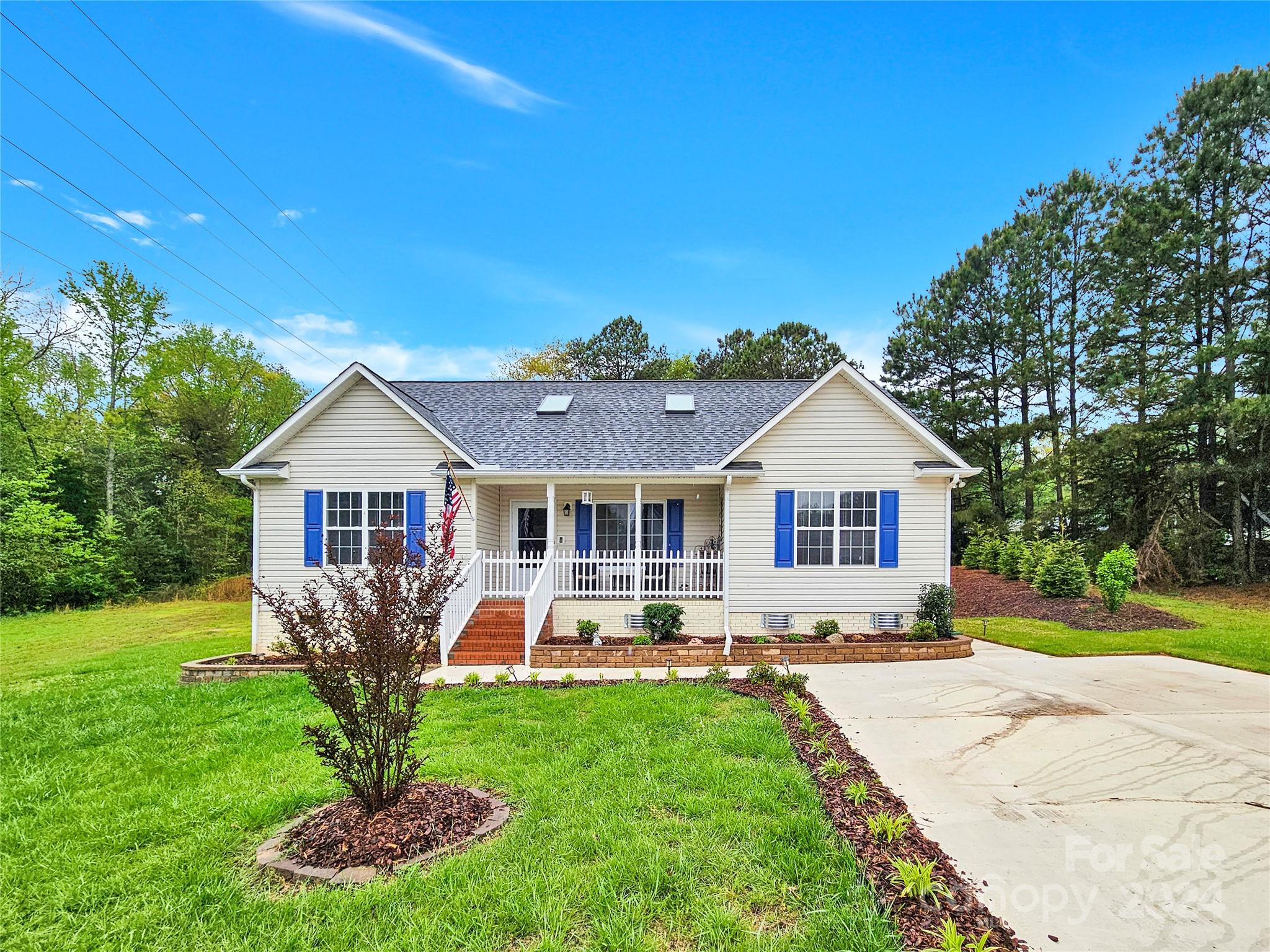 MOVE-IN-READY ranch home on cul-de-sac lot w/tons of privacy and a DREAMY back yard! Freshly painted with upgraded LVP flooring, light fixtures, and newer HVAC (2021) make it easy to move right in. Huge living room w/vaulted ceilings that allow tons of natural light to flow through. Renovated kitchen includes SS appliances to convey. Dining area off the kitchen (previously a screened porch) provides a functional living space w/upgraded lighting and beautiful back yard views. Owner's suite is spacious, features a new light fixture w/fan and spacious closet. Primary bath features an upgraded single vanity and a shower with sliding glass door. Secondary bedrooms on the opposite wing of the home with full bath in between. Step outside and be wowed by the huge deck w/retractable awning & solar lights plus pet run & ENORMOUS paver patio w/retaining wall & incredible nature views! Huge shed for added storage to convey.  MUST SEE!!!
