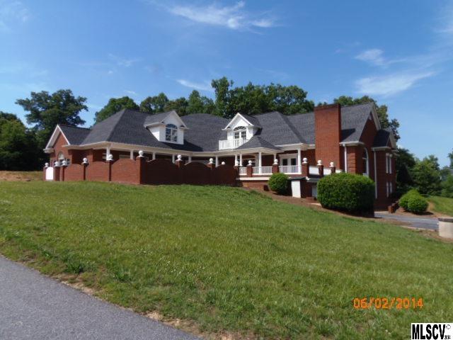 Former grand estate needs an extensive investment and repairs.  This property can easily accommodate two families with separate attached garages and entrances.Tax records show original house built in 1992 with large addition in 2006.  Septic tank permit for addition only. Buyer must carefully inspect-kitchen cabinets, HVAC units, plumbing fixtures, light fixtures, driveway gate, pool equipment, outside kitchen appliances , and carpet are just some of the items that have been removed from house.   Square footage numbers are approximate-provided by appraiser-tax records indicate less square footage-buyer must verify accuracy.  Additional rooms not listed in MLS that have closets and windows-also extensive storage space in attic, basement, and both  garages.  House is on two separate pieces of property