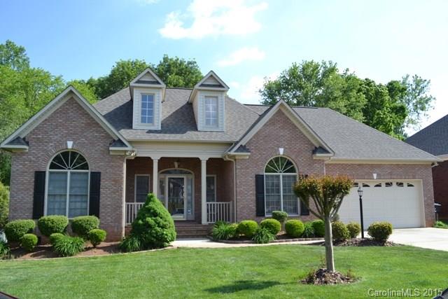 Pride of ownership shines in this home. All brick ranch with a split bedroom plan. Formal dining room with vaulted ceiling, spacious kitchen and eating area. Great Room is vaulted and has a fireplace/gas logs. Hardwood floors throughout with exception of tile in bathrooms. Double garage, front porch and wonderful deck for enjoying mother nature. A pleasure to show!