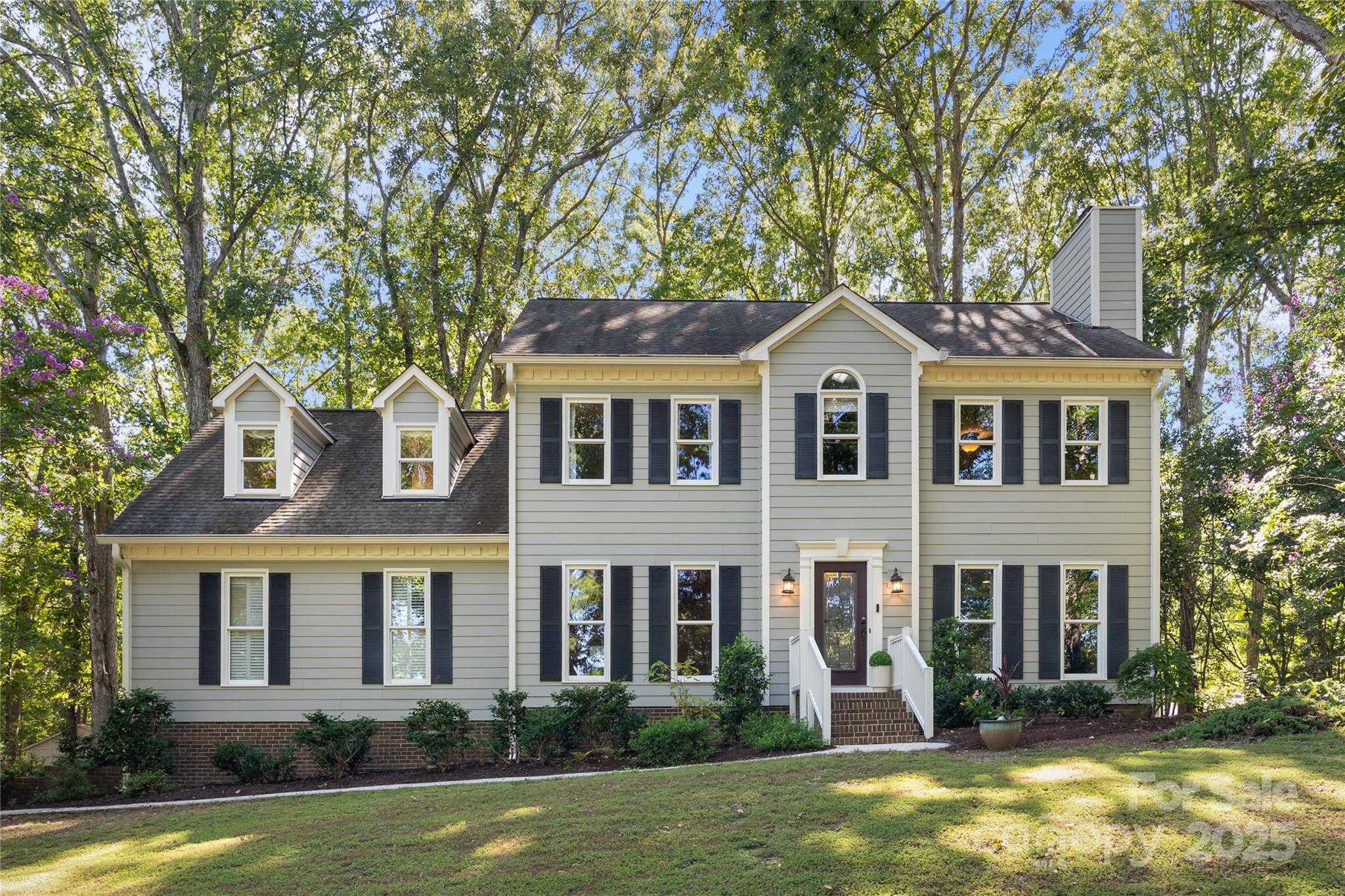 Charming home on almost an acre in sought after Tara Plantation with Fort Mill Schools. Location is key and this community and home offer both convenience and seclusion. You'll feel like you're worlds away when you arrive, yet everything you need is just minutes from home. Meticulously maintained and updated over the years with appealing features such as low maintenance fiber cement siding (2015), newer windows (2013), newer deck (2015), newer HVAC on main level (2019) and an encapsulated crawlspace (2023). Solid oak hardwood floors throughout most of the home, a charming kitchen (new stove & fridge 2019), attractive upgraded and updated bathrooms, stylish light fixtures, on trend paint colors, stacked stone fireplace surround and more! This classic home boasts a cozy family room with a gas log fireplace that is the focal point of the room. The dining room could also be a flex space depending on your lifestyle - the sellers are using it for billiards and the previous owners used it for an office (it has doors so it can be closed off). The kitchen has an abundance of counter space as well as a center island that is perfect for prep or serving. There's also a built in drop zone as you enter from the garage. The breakfast area has a bay window that overlooks the beautiful backyard and there's an adjacent sitting area with built in shelves and cabinets that makes a perfect spot to sit and enjoy a good book or a cup of coffee. Upstairs you'll find the spacious primary suite with a walk in closet and the primary bath showcases a dual sink vanity, framed mirrors, designer fixtures, custom tile shower and floors, and a claw foot tub. There are 2 additional bedrooms plus a larger 4th bedroom that could also be used as a bonus room if desired. The hall bath is tastefully appointed with a dual sink vanity, framed mirrors, tiled tub/shower combo and tile floors. Be sure to check out the 3rd floor bonus area that makes a great spot for movies, video games, crafting, etc. The garage offers plenty of space to park 2 cars easily and still leaves room for storage. Last but not least, the outdoors will not disappoint. The oversized deck has built in benches and has been freshly painted. The wooded yard offers privacy and endless opportunities for those with a love for the outdoors, including a wood burning fire pit. There are 2 sheds. One shed for storing lawn equipment and all of your outdoor toys. The other is finished, wired with electricity and has a mini split HVAC system, making it perfect for a She Shed or Man Cave. This home and property truly has it all! Don't miss your opportunity!