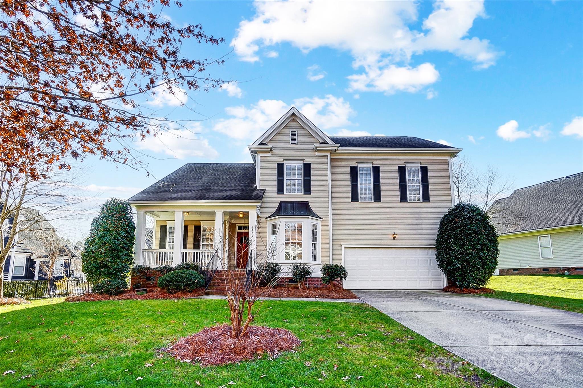 Located in the highly desirable Trail Ridge neighborhood on the Tega Cay peninsula, this Saussy Burbank home offers endless potential. Priced to allow your personal vision for upgrades, the versatile floor plan includes a main-level primary suite, a vaulted two-story great room, a formal dining room, and a front study. The second level features three spacious bedrooms, a large bonus room, and an unfinished space ready to become a second office, workout room, or media room. Enjoy ample walk-in storage throughout. New carpet installed. Outdoor living shines with a low-maintenance fenced backyard, Trex decking, and privacy provided by lush green space. Relax on the charming rocking chair front porch and take full advantage of the Tega Cay lifestyle, including lake access, pickleball, tennis, golf, trails, pool, and more. Your vacation lifestyle starts here! Zoned to award winning Fort Mill Schools, close to shopping, commerce and within 30 minutes of airport.