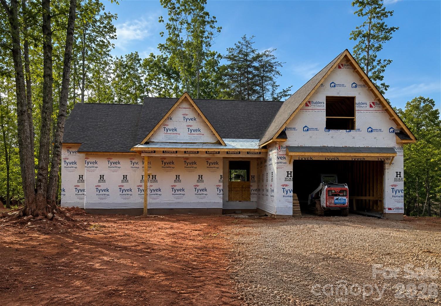 This beautiful 4 bedroom, 4 full bath, new construction home blends modern farmhouse charm with upscale craftsmanship in a peaceful wooded setting. The exterior features a striking combination of steep front-facing gables, a 10 x 33 oversized covered rear porch and spacious front porch that creates a warm and inviting curb appeal. Large two-car garage, and a dramatic upper-level bonus and flex space framed by the oversized dormer. The tall rooflines and multiple peaks give the home a custom-built luxury appearance while maximizing interior ceiling height and natural light. Set on a gently sloping homesite surrounded by mature trees, the property offers privacy and a serene atmosphere while still feeling open and spacious. The septic system has been designed to leave room for a pool and can be added for an additional fee. This home is ideal for buyers seeking: Open-concept living spaces, Large entertaining areas, bonus/media room upstairs with a full bath, Custom finishes and designer detail!