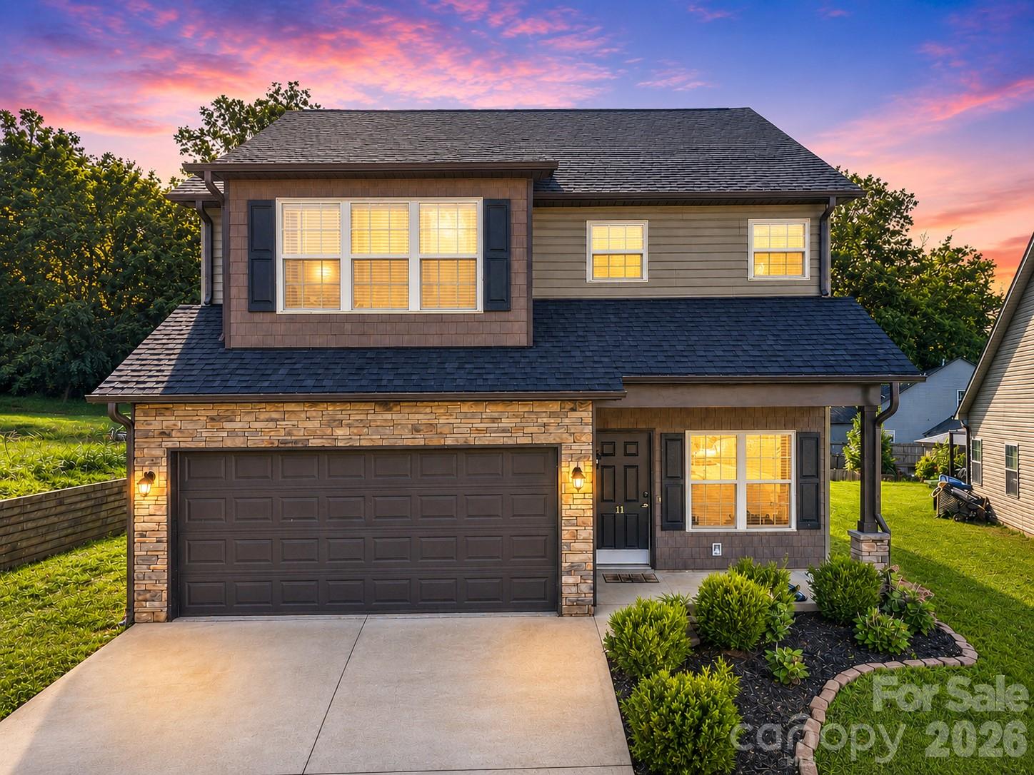 Welcome to this beautifully maintained home located on a desirable cul-de-sac lot in the sought-after Mallard Run community of Arden. This thoughtfully designed residence offers the convenience of main-level living, featuring a spacious primary suite and primary bath on the main floor. The open-concept layout seamlessly connects the living, dining, and kitchen areas, creating an inviting space for both everyday living and entertaining. Enjoy year-round natural light in the sunroom, perfect for relaxing with a morning coffee, reading, or creating a flexible hobby or office space. Upstairs, you’ll find additional bedrooms and living space, providing privacy and flexibility for family and guests. The cul-de-sac setting offers a peaceful atmosphere with minimal traffic, while the prime location places you just minutes from Biltmore Park, Asheville Regional Airport, shopping, dining, and major highways. Combining comfort, convenience, and a highly desirable location, this home is one you won’t want to miss.