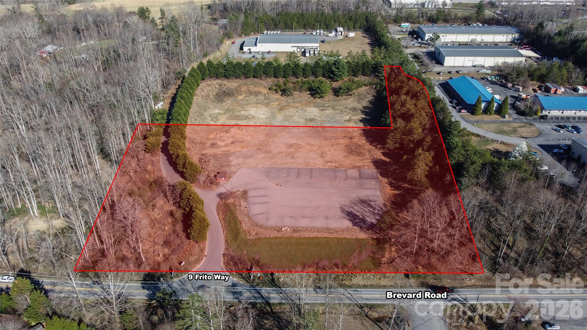 SELLER FINANCING AVAILABLE WITH FLEXIBLE TERMS:  Incredible 5.90 acre parcel in a high growth corridor of South Asheville (Arden NC). Conveniently located off Brevard Road (191) halfway between Biltmore Park and the Biltmore Outlet Malls. Only 1/2 mile from Borg Warner, 2 miles from Pratt & Whitney, Amazon.com Distribution center, plus much more. Zoned EMP, this site offers an incredible level building pad ready to be developed for industrial, manufacturing or multi-family. All with utilities available. Site has some existing storm water infrastructure along with a curbed entry. NOTE:  ADJACENT LAND- OWNER IS ALSO FOR SALE.  THE RED SHADED AREA REPRESENTS BOTH PARCELS.