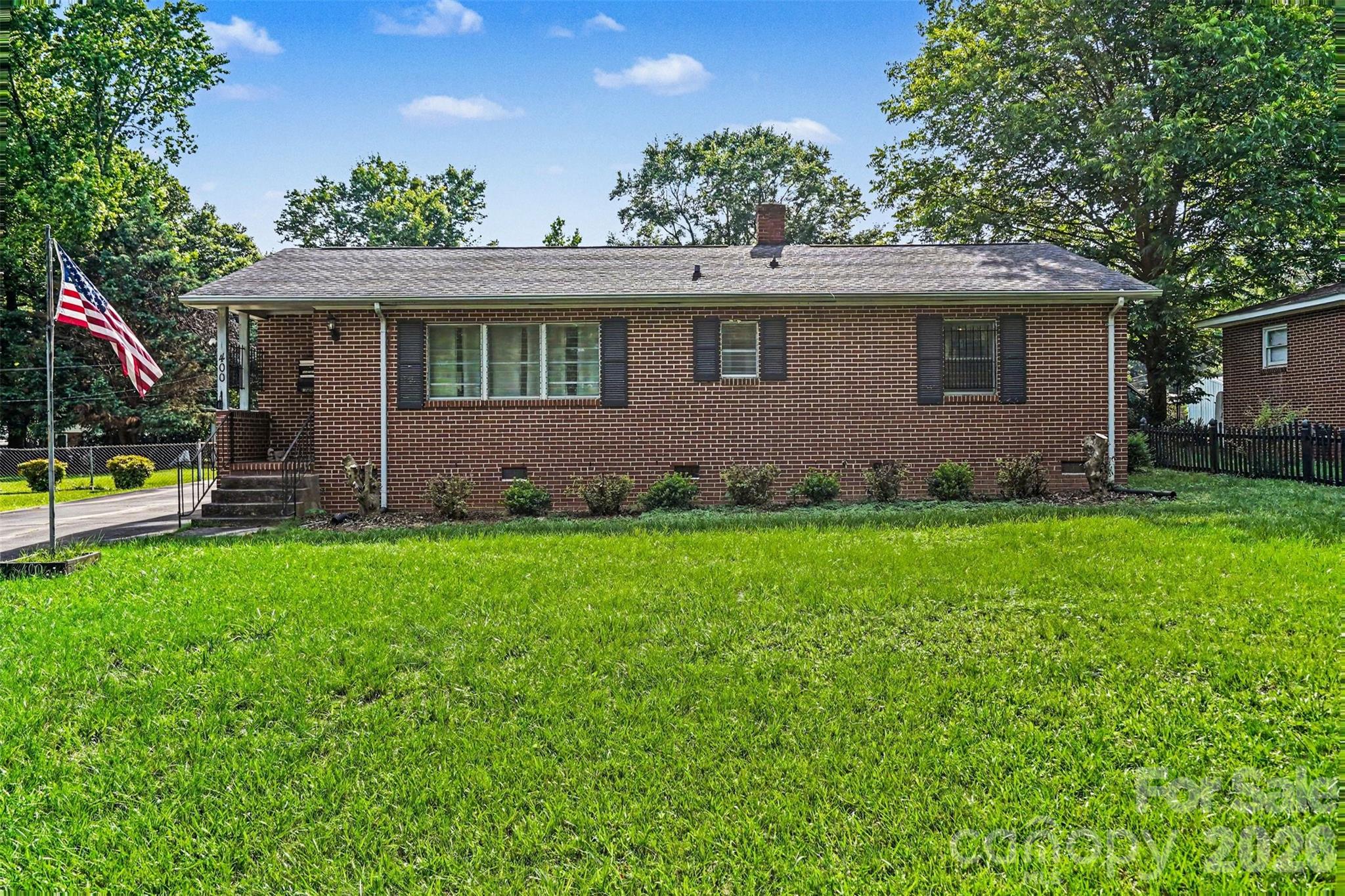 Charming full brick ranch in an established East Charlotte neighborhood being sold fully furnished! This 3BR/1BA home offers timeless character, beautiful hardwood floors, and endless potential for homeowners, investors, or short-term rental opportunities. Situated on a spacious 0.25-acre lot with a huge driveway and detached garage/workshop, there is plenty of room for storage, hobbies, parking, or future expansion. Conveniently located near Uptown Charlotte, shopping, dining, and major highways.