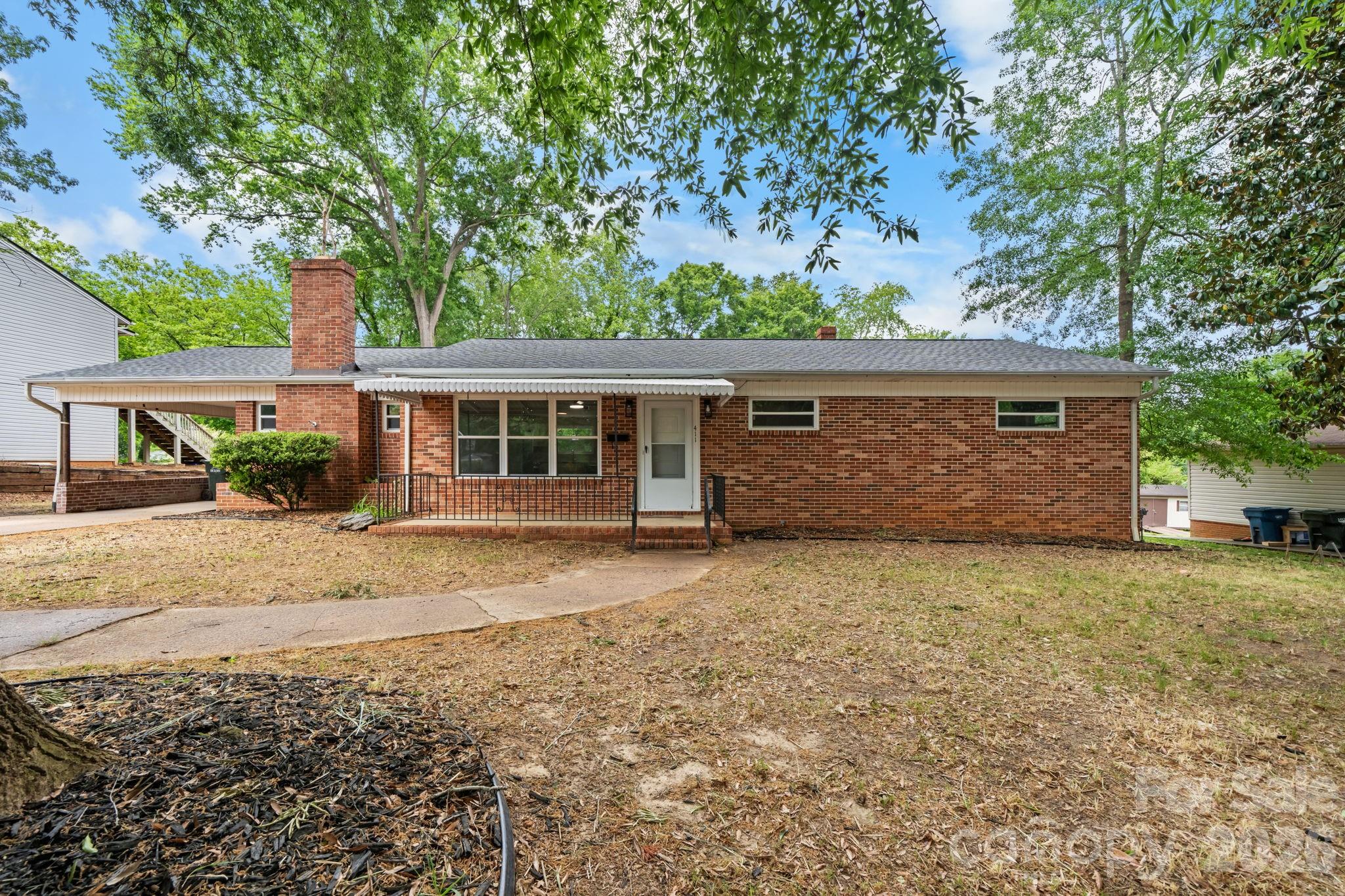 Renovated full-brick ranch nestled in the heart of Hickory! This beautiful home features a gorgeous updated kitchen with stainless steel appliances, premium flooring throughout, and a desirable split-bedroom floor plan. The spacious bedrooms offer comfort and flexibility, while the stunning primary bathroom showcases a double vanity, LED mirror, and unique modern details. Enjoy additional living space with a bonus room accented by French doors, plus a cozy den perfect for relaxing, working, or entertaining. Outside, you’ll find a large backyard with plenty of room to enjoy. Conveniently located near shopping, dining, and so much more, this move-in ready home is a must-see!