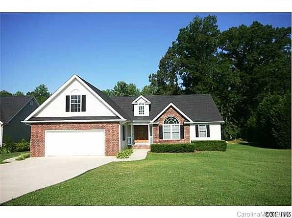 Don't miss this charming, open floor plan custom home w/over 2050 sq ft. Home features 3 full BRs & 2 full BAs on main & bonus or 4th BRm and 3rd full BA above your spacious 2 car garage. Great room has HW flrs & a gas FP, opening into the screened porch overlooking the pool. Over 870 sq ft of unfinished walk-in attic space awaits expansion or storage needs. Yard is 1.43 acres of low maintenance landscaping with a park like atmosphere including your own bridge over the natural running creek.