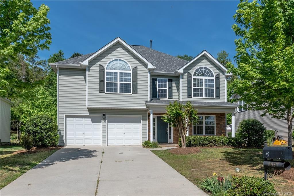 A must see! 4 bedroom, 2.5 bath home in SANDY POINTE @ SUTTON. Open floor plan with formals, kitchen, breakfast and family room. 4 BR upstairs with large master suite and bath. Fresh neutral paint throughout and new kitchen flooring and carpet! Patio and semi-wooded lot perfect for entertaining. Seller in the process of having new carpet installed.  Washer/dryer and refrigerator are negotiable.