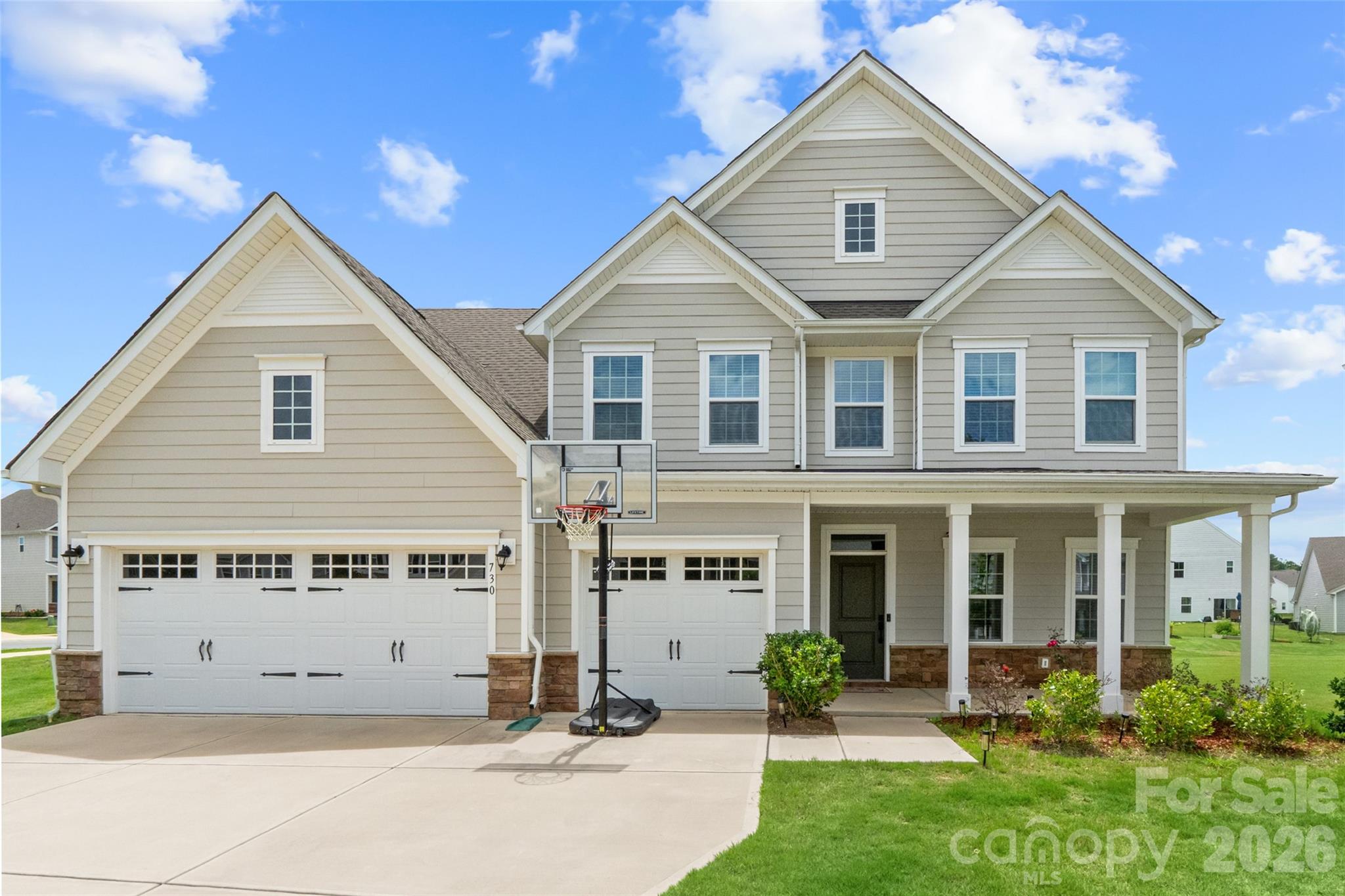 Welcome to 730 Autumn Sage Drive, this beautifully maintained 5-bedroom, 4-bathroom residence located in the highly desirable Springshire Creek community in Indian Trail. This nearly new home offers a spacious and functional layout designed for modern living. The main level features a private bedroom and full bath, ideal for guests or a home office, while the upper level includes four additional bedrooms and three full bathrooms.

The interior showcases a bright, modern design with comfortable living spaces and a layout that flows effortlessly throughout the home. Outside, enjoy excellent curb appeal, a concrete driveway, and an attached 3-car garage providing ample storage and parking. Conveniently located near shopping, dining, and everyday essentials, this move-in-ready home combines comfort, convenience, and style in one exceptional package.