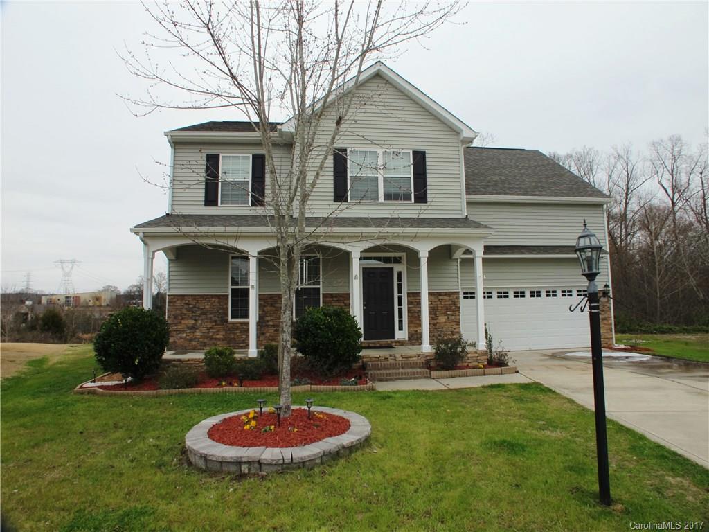 Beautiful 4 bedroom home on cul-de-sac lot with large rocking chair front porch, living room with fireplace open to dining and kitchen. Hardwoods throughout first floor, large 10X16 screened porch with ceiling fan, gorgeous forest view,huge master suite with trey ceiling has 100 sq ft storage that can be converted into another walk-in closet, large secondary bedrooms, laundry is on the 2nd level, home has an irrigation system for entire yard.