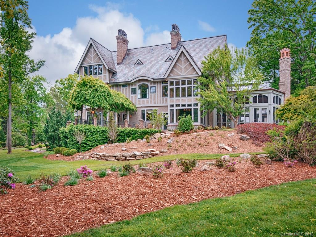 Arts and Craft Tudor of magnificent design and detail originally commissioned for actress Andie McDowell.  Sited on a double lot on the 7th hole of the Biltmore Forest County Club with mountain views. Incredible details and entertaining areas befitting a star including a new timbered porch with stone fireplace and integral heaters.