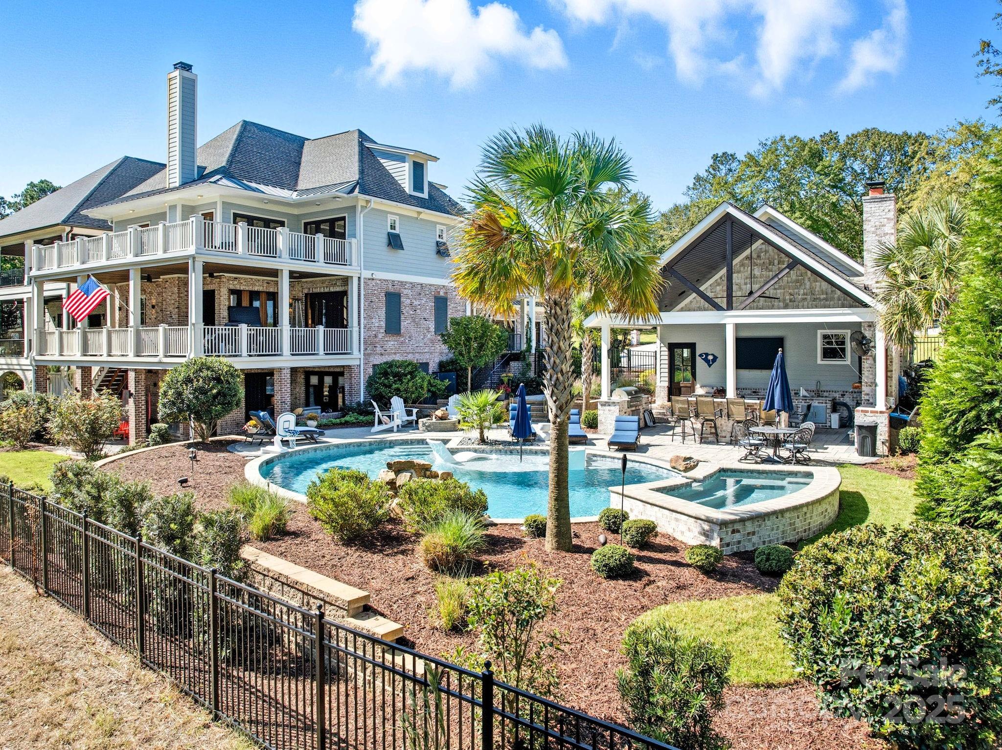 Southern Elegance Meets Resort Living on the 18th Hole in Cobblestone Park. Welcome to a rare masterpiece of luxury and craftsmanship nestled on the 18th hole (9 black) of the prestigious McConnell's Golf Course. This custom Southern Living estate offers over 5,500 sq ft of exquisite design and superior finishes. A true entertainer’s paradise and a serene retreat all in one. From the moment you arrive, you’re greeted by gas lanterns, stained glass accents, and mahogany garage doors, setting the tone for timeless elegance. Step inside to discover Brazilian wood floors with intricate inlays, soaring ceilings, elaborate woodwork, and a grandeur that flows throughout. 
Sophisticated Interior features include: 
4 Bedrooms, 4.5 Bathrooms, including two expansive primary suites
| Private elevator for seamless access across all 3 levels
| Marble-clad powder room with stain glass window
| Custom library with built-in bookcases and architectural molding
| Chef’s dream kitchen featuring Thermador ovens, Viking cooktop, quartz countertops, and ice maker
| Designer lighting throughout with new tap light switches
| Walkout basement has a wet bar with an ice maker, beverage fridge, billiards room and a wall of TV's so you never miss a game. Just step out to the covered porch to cook out on the built-in grill.

Enjoy three expansive levels of verandahs that offer panoramic views of the course and grounds. The stunning saltwater, heated gunite pool & spa includes: rock water feature, sun shelf, pool stools, smart features and top of the line pool equipment. Heated & cooled pool house with 1/2 bath. Outdoor pavilion with wood burning fireplace, Coyote grill, Brown Egg, ice maker, fridge, dual keg taps, soapstone countertops, surround sound, gas firepit with self igniter and even an outdoor shower.
This is more than a home — it's a private resort with every luxury imaginable. Whether you're hosting under the stars or enjoying a peaceful morning coffee overlooking the greens, this estate is designed to impress at every turn. Schedule your private tour today to experience this one-of-a-kind luxury home that redefines Southern living.

Living in Cobblestone Park means enjoying the perfect blend of community, recreation, and luxury — all enhanced by the prestige of McConnell Golf. As part of the McConnell Golf family, Cobblestone Park residents benefit from access to one of the most scenic and well-maintained courses in the Midlands, featuring 27 holes of championship golf surrounded by rolling hills and lake views.

Beyond golf, membership offers reciprocal privileges at all McConnell Golf clubs across the Carolinas, Tennessee, and Virginia — giving homeowners access to an impressive collection of private courses, fine dining, fitness centers, pools, and social events.

Whether you’re an avid golfer, a social member, or simply enjoy the peaceful beauty of a gated community, Cobblestone Park and McConnell Golf together create a lifestyle that’s active, welcoming, and refined — the best of Southern living.  Contact McConnell Golf for details on Membership Packages.