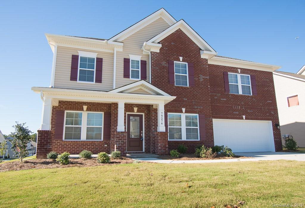 Absolutely STUNNING!! NEW home!! Seller's loss is your gain. HUGE corner lot with flat backyard. Five bedrooms with the master on main!! Almost 4000 square feet of home with all of the upgrades. Compare price against price to build. Get a deal and skip the build time! Coffered ceilings, wainscoting, surround sound speakers throughout home. Hardwood floor, gas logs, open floorplan.