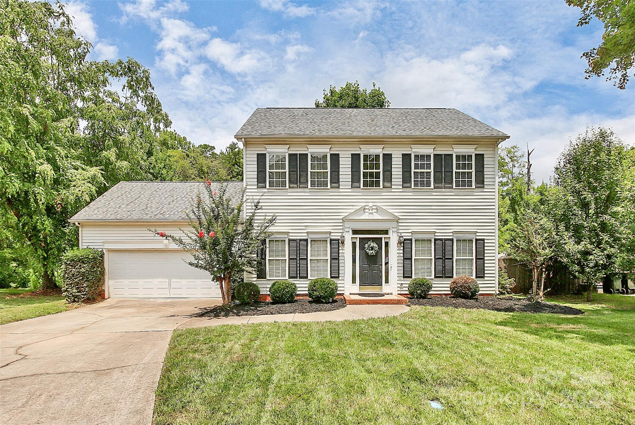 Nestled in a serene cul-de-sac, 1698 Brandy Hill offers a charming 3-bed, 2.5-bath retreat. Recent updates include a 2024 roof. Be welcomed by the large open foyer.  There is plenty of space for everyone with formal dining and formal living room. The kitchen offers granite countertops & Gas cooktop. Wood floors grace the main level, complementing a gas log fireplace in the great room.  The primary bedroom features a spacious bath with double vanity, separate shower, soaking tub, and large walk-in closet. Step outside to a paver patio with fire pit in a private backyard enveloped by lush greenery and fresh landscaping. Enjoy prime proximity to shopping, medical, dining, and I-77 and minutes from the airport. The perfect blend of comfort and convenience awaits!!