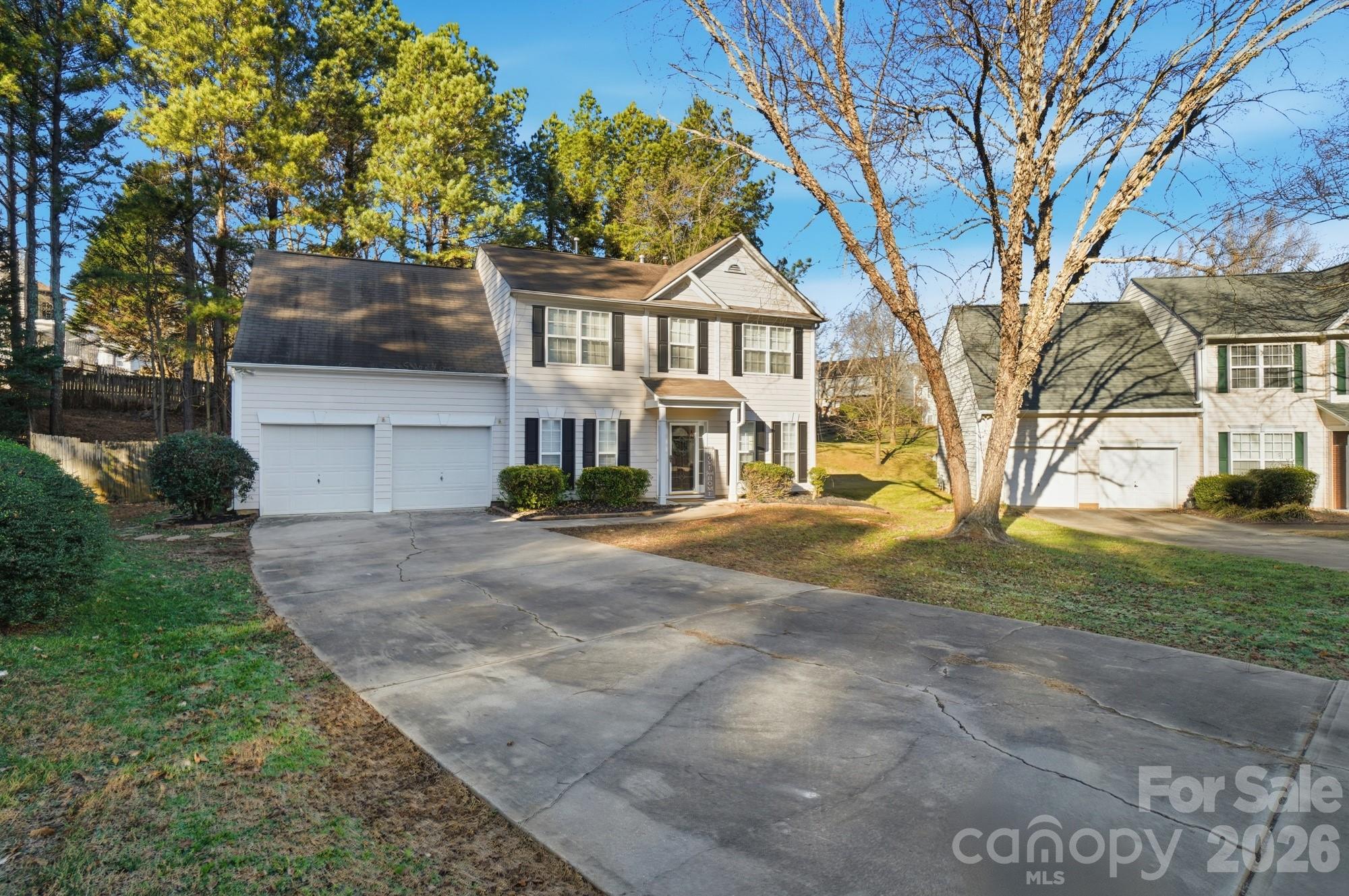 LOCATION, LOCATION, LOCATION! Ideally situated near PNC Music Pavilion and just minutes from Interstate 485, Concord Mills, popular dining, and Charlotte Motor Speedway, this move-in-ready home offers comfort, convenience, and value!

Nestled on a quiet cul-de-sac, this beautifully updated 4-bedroom, 2.5-bath home features fresh interior paint, a brand-new HVAC system (2026), new upstairs carpet, a new vanity in the primary bathroom, and stylish modern light fixtures throughout.

The spacious primary suite includes a private en-suite bath and a walk-in closet, while one of the secondary bedrooms also offers a rare walk-in closet for added storage and functionality.

Step outside to enjoy a private backyard surrounded by mature trees — the perfect setting for relaxing evenings, entertaining guests, or summer gatherings.

Don’t miss this incredible opportunity in a highly desirable location. Priced to sell!