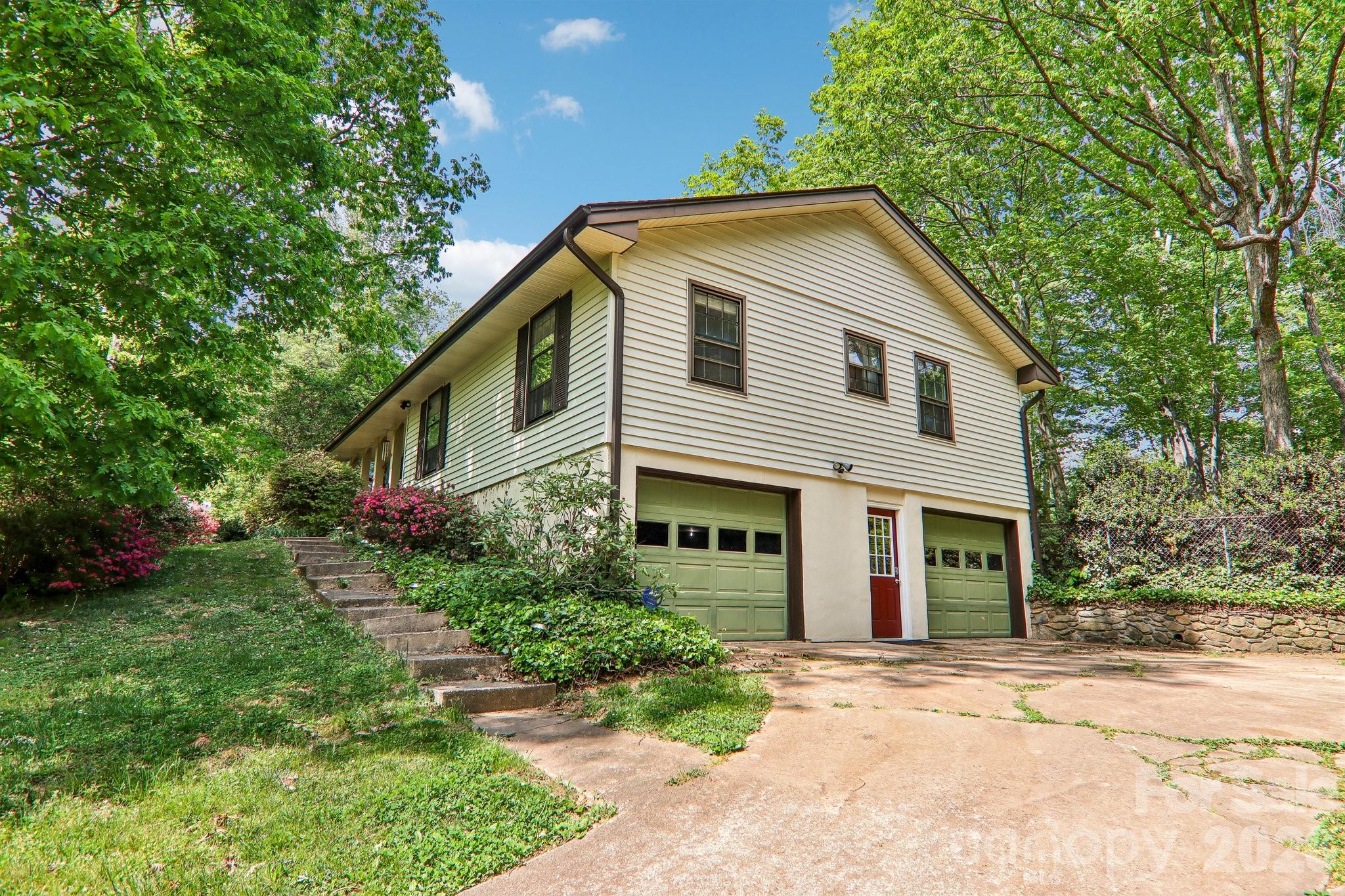 Discover this beautiful home in one of Arden’s most charming neighborhoods. St. Andrews features quiet cul-de-sacs throughout and a welcoming, neighborly feel. Just a five-minute walk from your front door leads to the trailhead of Collier Cove Nature Preserve—perfect for an easy hike anytime. This home welcomes you with gorgeous bamboo flooring, a spacious updated kitchen, a bright four-season sunroom perfect for morning coffee, and a large back deck ideal for entertaining. Relax under mature maple trees in the fully fenced backyard or let your fur babies safely run and explore! The expansive, basement with conditioned space provides incredible flexibility for storage or additional living space. Conveniently located just minutes from Gerber Village, Whole Foods Market, and Jake Rusher Park, this home also falls within the highly regarded Glen Arden school district.