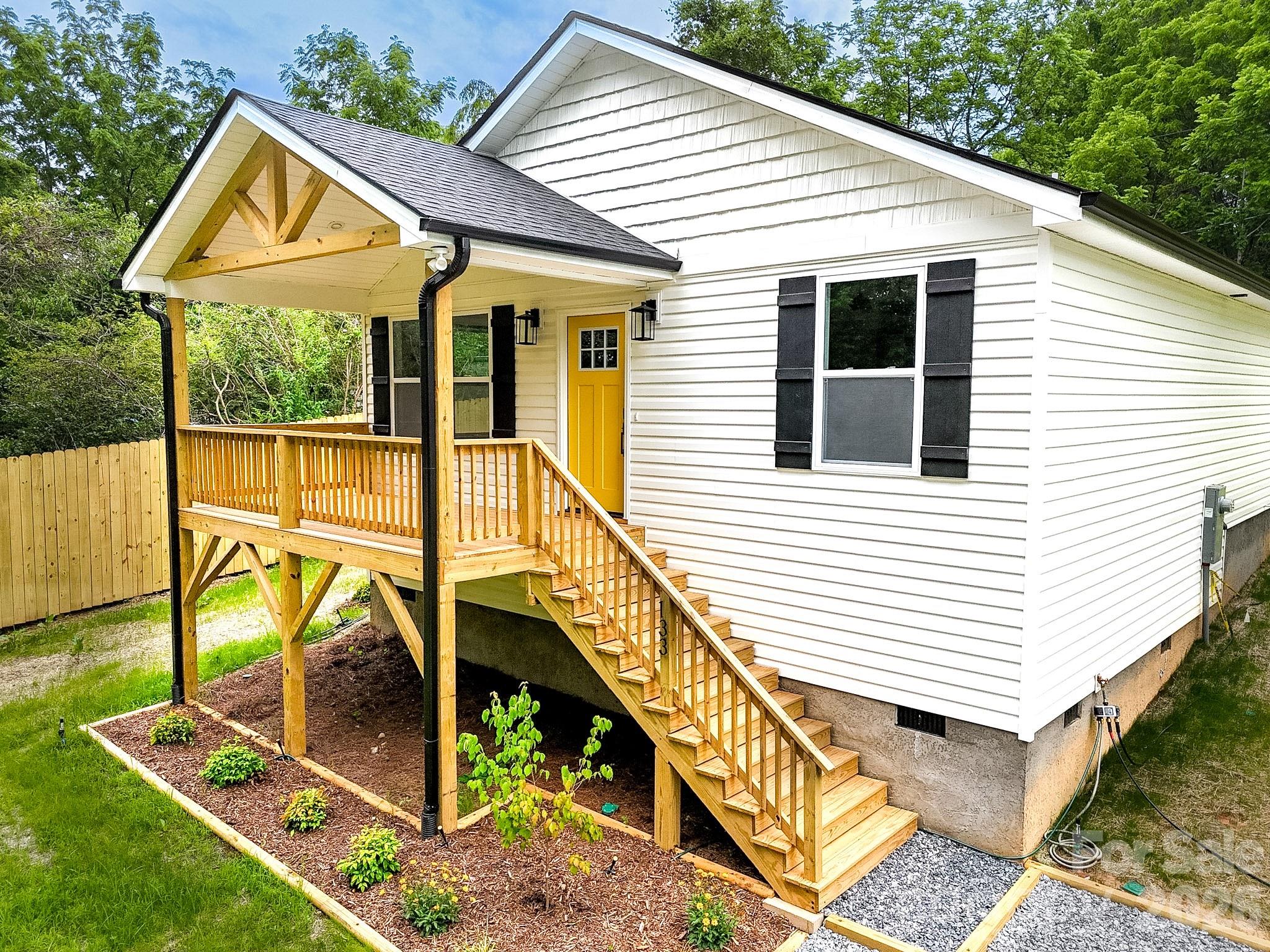 Embrace the tranquility of mountain living in this brand-new construction in Hendersonville, where modern comfort meets natural beauty. Just minutes from Jump Off Rock and DuPont State Forest, outdoor adventure is always close by. Enjoy local flavors at Postero, Shine, or brunch at Arabella, and grab your morning coffee at Art & Coffee Bar. Inside, an open floor plan bathed in warm natural light is perfect for entertaining. The spacious primary suite features a walk-in closet and elegant bath with dual vanity and custom tile shower. Luxury vinyl plank flooring flows throughout, and the kitchen shines with stainless steel appliances, granite countertops, and soft-close cabinets. Step onto the spacious deck to soak in the crisp mountain air. Ideal as a primary residence, peaceful retreat, or investment opportunity — this home is your gateway to the best of Hendersonville living. Potentially up to $2,500 in closing credit.*