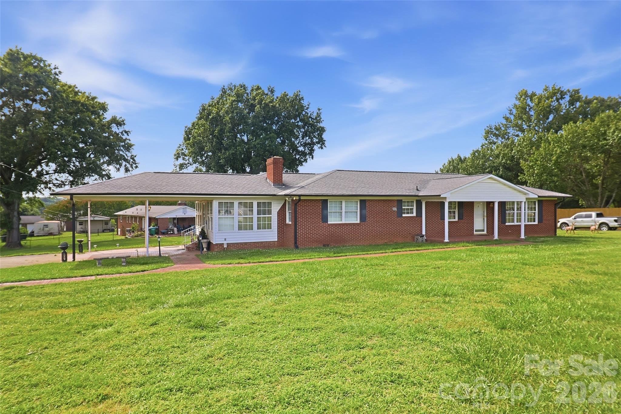 This charming 3 BR, 2 BA, brick ranch is a must see! This well maintained home features hardwood flooring throughout, and a cozy den with fireplace. The spacious kitchen is the heart of the home and is perfect for entertaining and cooking. The bright, beautiful sunroom is perfect for those early summer mornings and leads out to a covered carport.Conveniently located to all the amenities and events that Bessemer City has to offer, this home is the perfect blend of classic charm and comfortable living. Book your tour today!