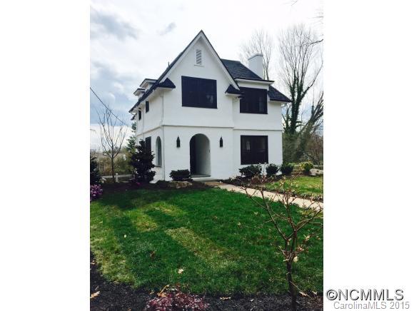 Beautifully remodeled 1920's home with views of Downtown.  Completely remodeled inside and out.  House features Stainless Appliances, Granite, Hardwood floors throughout, Vintage light fixtures, and two beautiful Fireplaces.  Updates include new roof, new gutters, all new kitchen and bath, new gas boiler, and landscaping.  A MUST SEE!!
