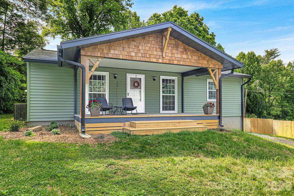 Minutes from Downtown Brevard, this charming 3-bedroom, 1-bathroom home is situated on just over half an acre and is ready for its next chapter! Step inside to a main level that features an open living and dining area, creating a seamless space that is absolutely perfect for entertaining.

Notable recent updates provide incredible peace of mind, including a brand-new roof, a fresh siding paint refresh, and updated decking. Inside, you'll find tasteful cosmetic updates throughout, while still leaving the perfect canvas for your own personal touches. Step outside onto the welcoming front deck to enjoy casual evenings relaxing outdoors.

Downstairs, you'll find an additional 719 square feet of heated, partially finished space (not included in the overall square footage) that offers massive potential. Featuring a private entrance, this area lays the perfect footprint for a future studio, custom flex space, home office, or an ideal workshop with excellent storage. This home truly adapts to your lifestyle—don't miss out on this Brevard gem!