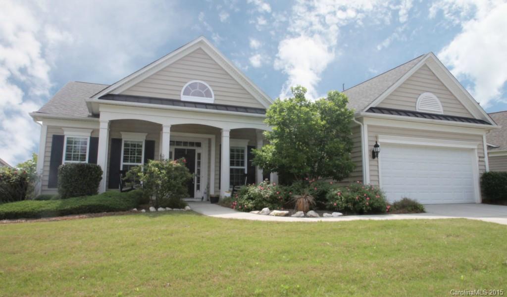 Bluffton Cottage with Screened Porch & Private View! Great Floor Plan with Welcoming Front Porch. Spacious Great Room w/ Cabinetry & Fireplace. Gourmet Kitchen w/ Hardwoods, Granite Counters, Stainless Appliances, & Nook. Bright & Airy Screened Porch & Patio w/ Private View! Owner’s Suite Leads to Private Bath with Dual Sinks & Oversized Walk-In Closet. Guest Suite & Private Bath. 3rd Bedroom or Office Provides Flexible Living Space. Amenities Galore in this 55+ Active Adult Community!