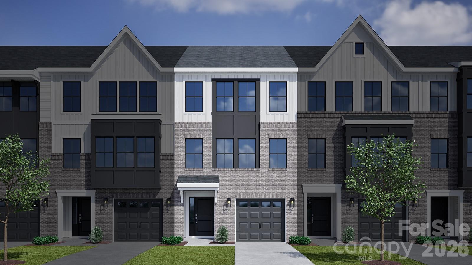 This three-story townhome includes three bedrooms, two-and-one-half bathrooms, and a one-car garage. The porch and garage entrances lead to a bonus room with an optional fireplace and patio, that can be converted into a guest bedroom, featuring a full bathroom. The garage entrance offers an optional bench and cubby or organizational cabinet. The first flight of stairs leads to the open concept kitchen with optional deck, eat-in area and great room with an optional fireplace. A powder room completes the second floor. The third floor includes the primary suite with dual walk-in closets and an optional boxed ceiling and dual vanities. Down the hall, you will find two secondary bedrooms and one full bathroom. A laundry closet is located just outside of the secondary bedrooms for ultimate convenience. There is an alternate third floor plan that offers a dual primary suite with a walk-in closet and en suite bathroom in lieu of the two secondary bedrooms.